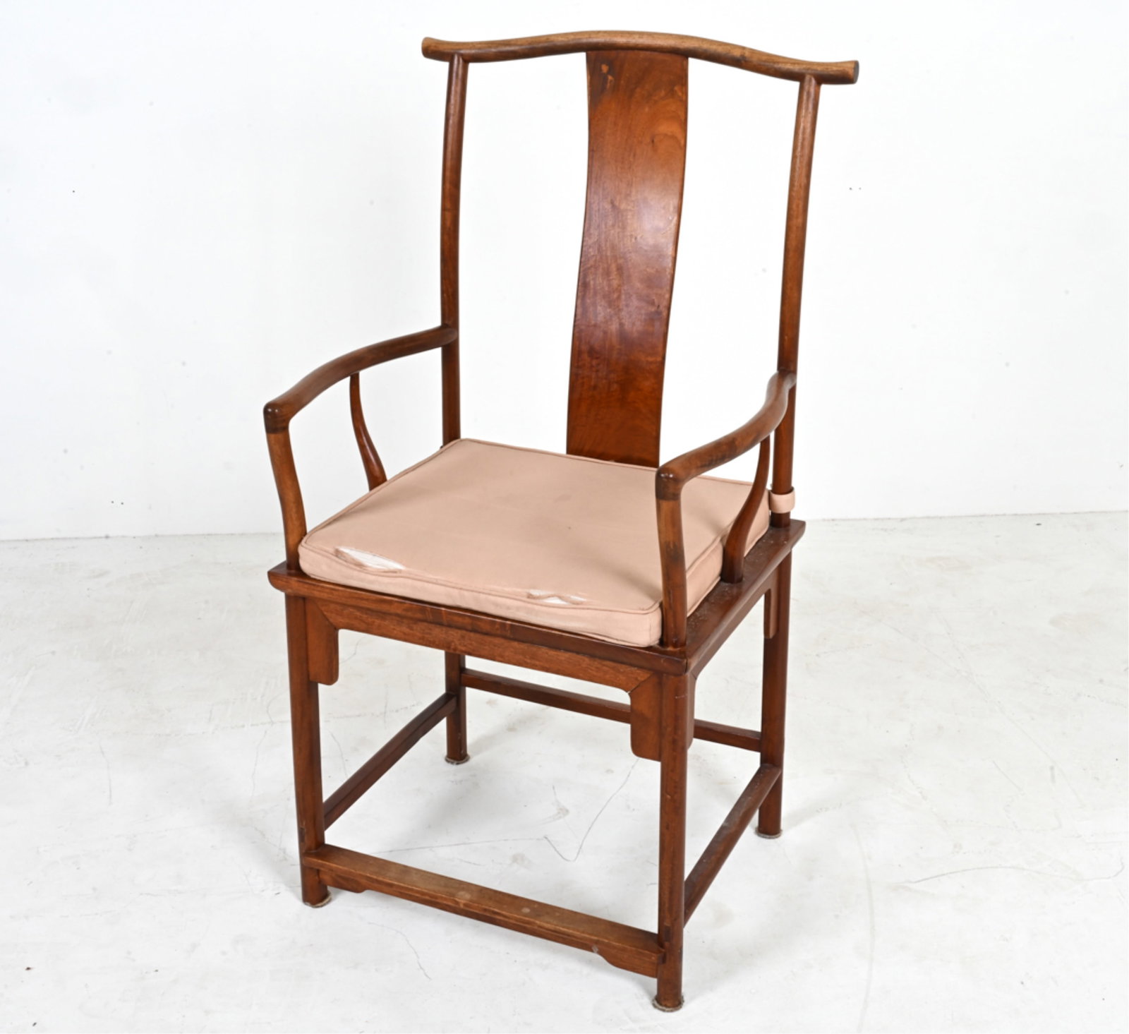 CHINESE HUANGHUALI HIGH-BACK ARMCHAIR: Dimensions: H 46" x W 25" x D 21.5" x SH (without cushion) 20" Condition: In very good condition overall. Some joint separation to seat; spots of soiling to wood at seat and side stretchers. Fading an