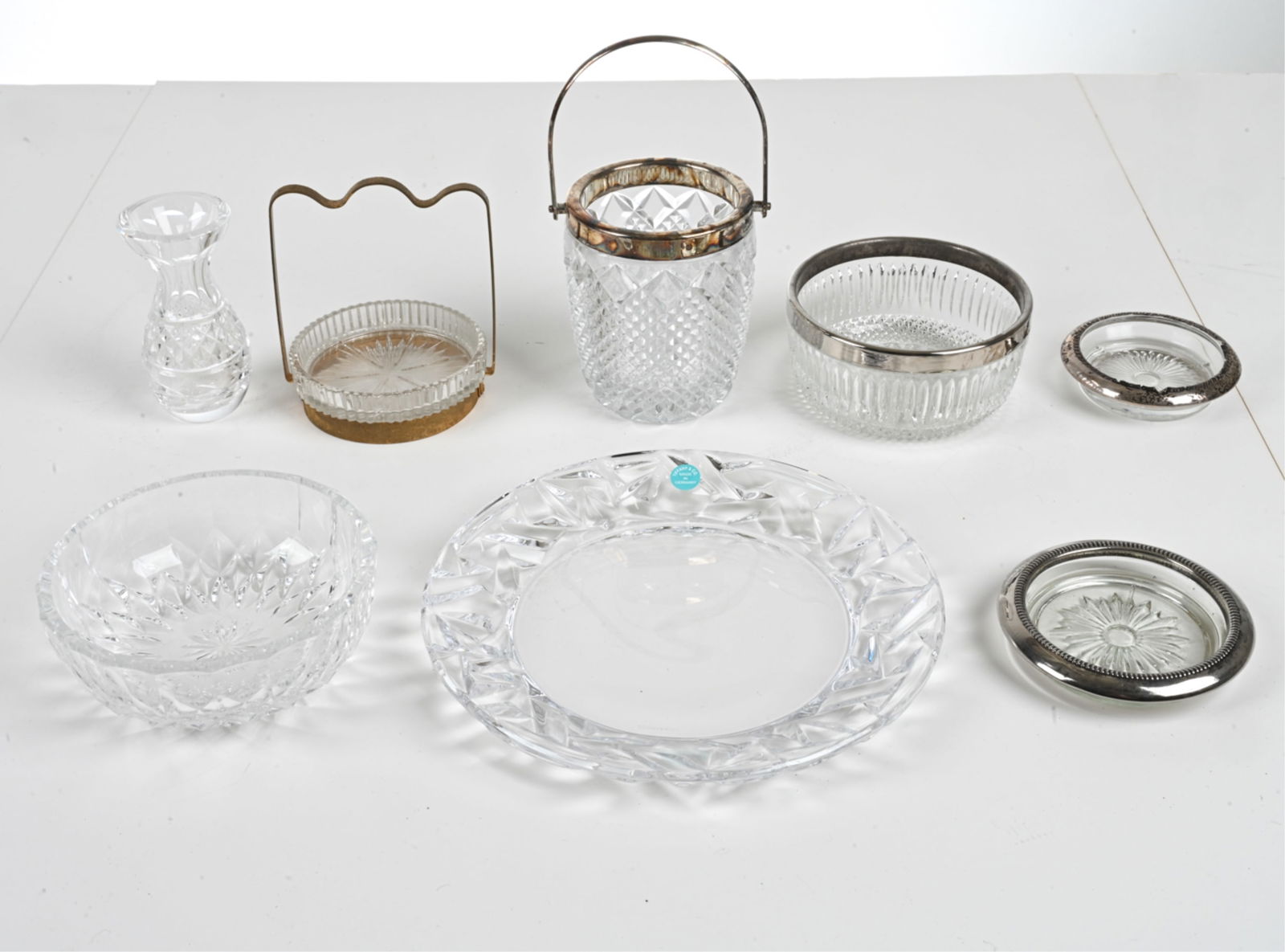 GROUP OF CRYSTAL & GLASS TABLEWARE INCL. TIFFANY: Includes: Tiffany & Co. "Rock-Cut" crystal dish, Val St. Lambert cut crystal bowl, various silver-mounted wine coasters and other items. Dimensions: (Tiffany dish) Dia. 8" Condition: Tiffany dish in e