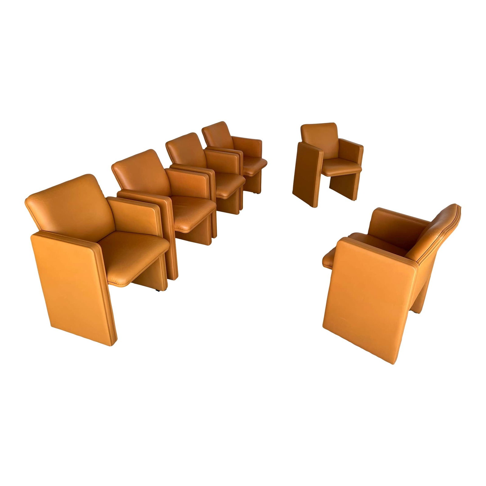 (6) LEATHER ARMCHAIRS BY TITO AGNOLI FOR POLTRONA: Set of 6 THF96 Lounge Leather Armchairs Designed by Tito Agnoli for Poltrona Frau, Italy. Marked "Poltrona Frau" and "Made in Italy" under the seat and stamped on the leather. Dimensions: H 33..3" x W