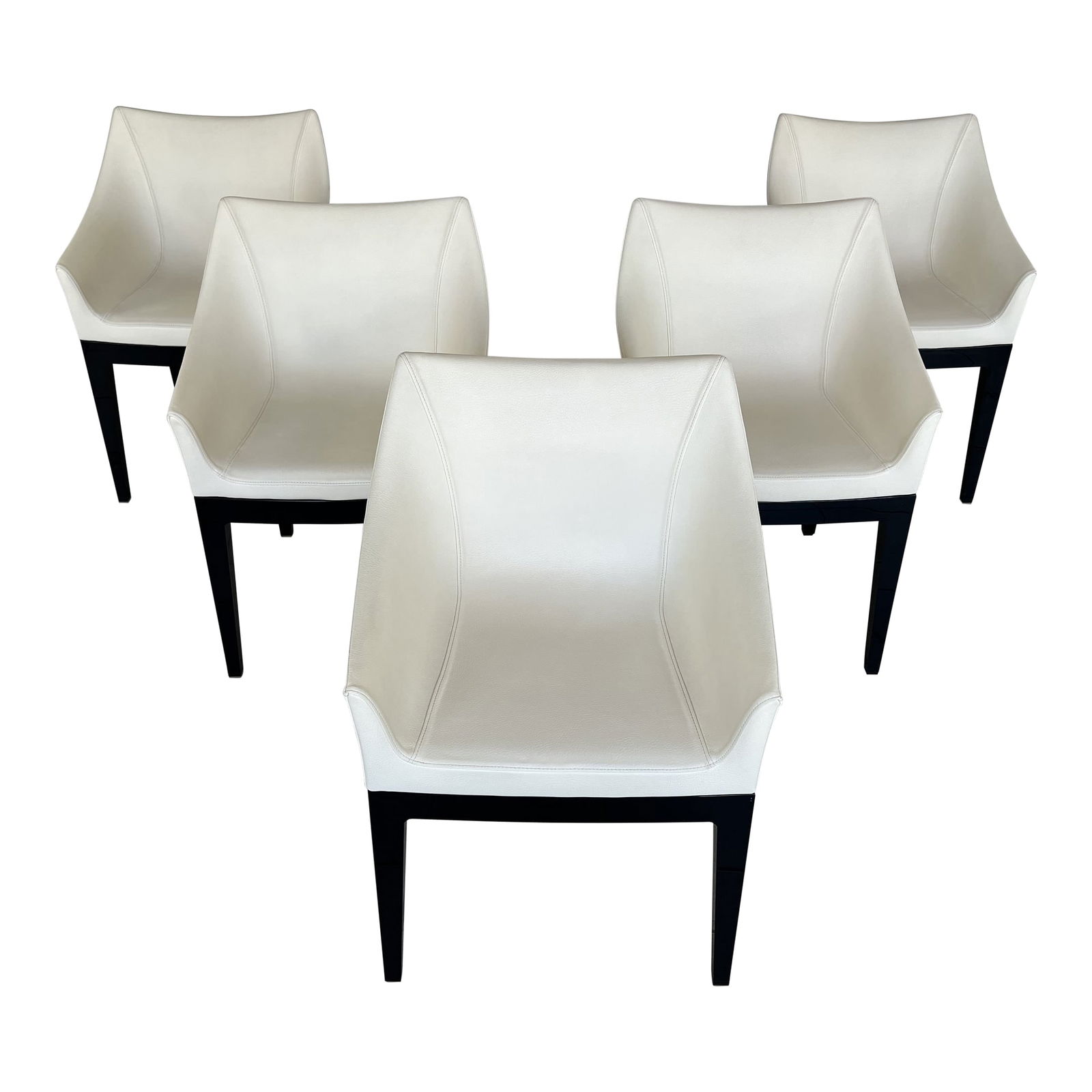 (5) CHAIRS BY PHILIPPE STARCK FOR KARTELL: set of 5 Italian Leather Mademoiselle dining chairs, designed by Philippe Starck for Kartell. The chairs are with black colored polycarbonate frame and seat in polyurethane, covered in white faux leat