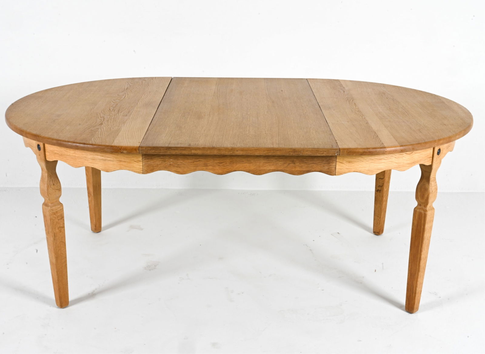 MANNER OF HENNING KJAENULF ROUND OAK DINING TABLE (1 of 18)