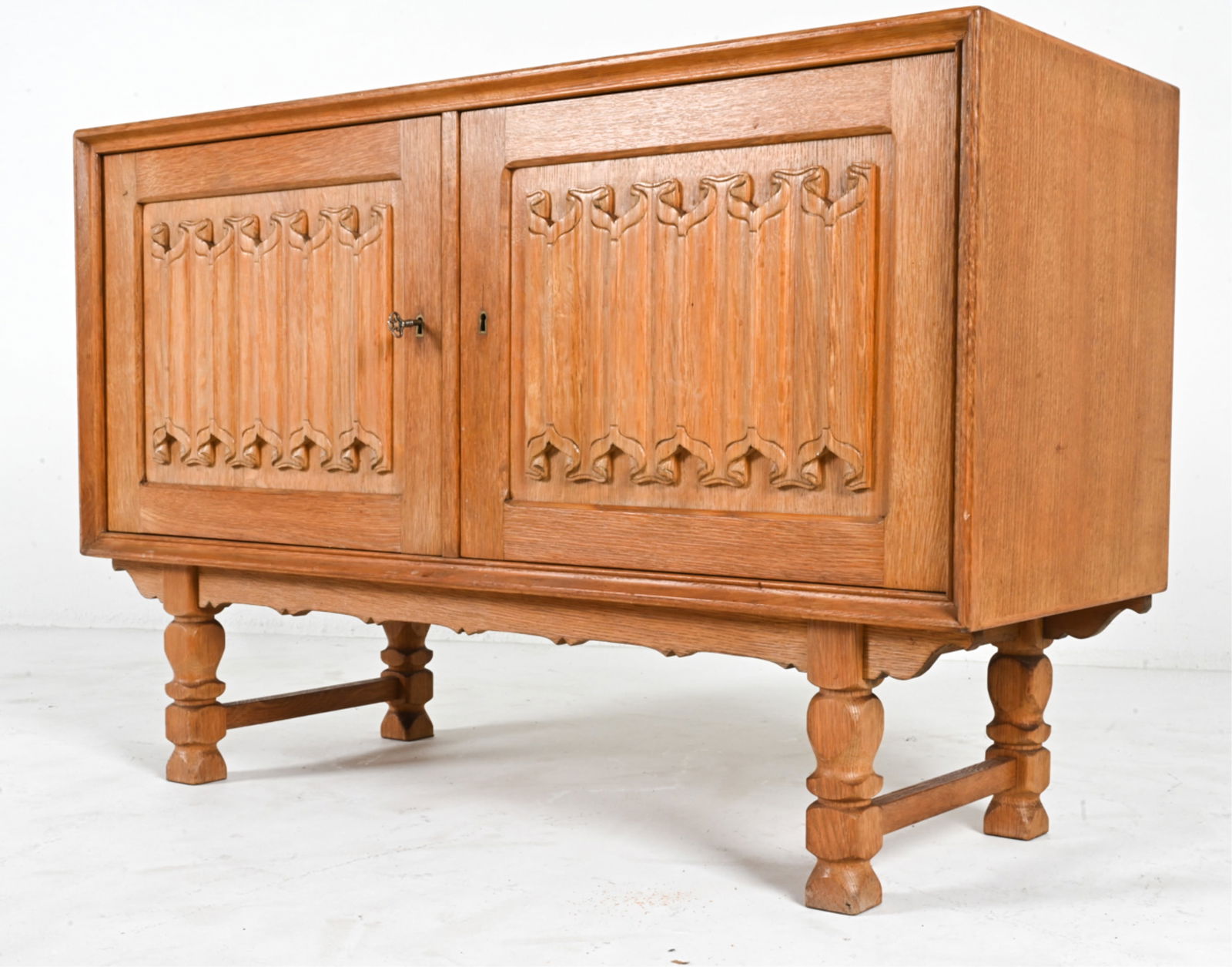 MANNER OF HENNING KJAERNULF CARVED OAK CABINET (1 of 12)