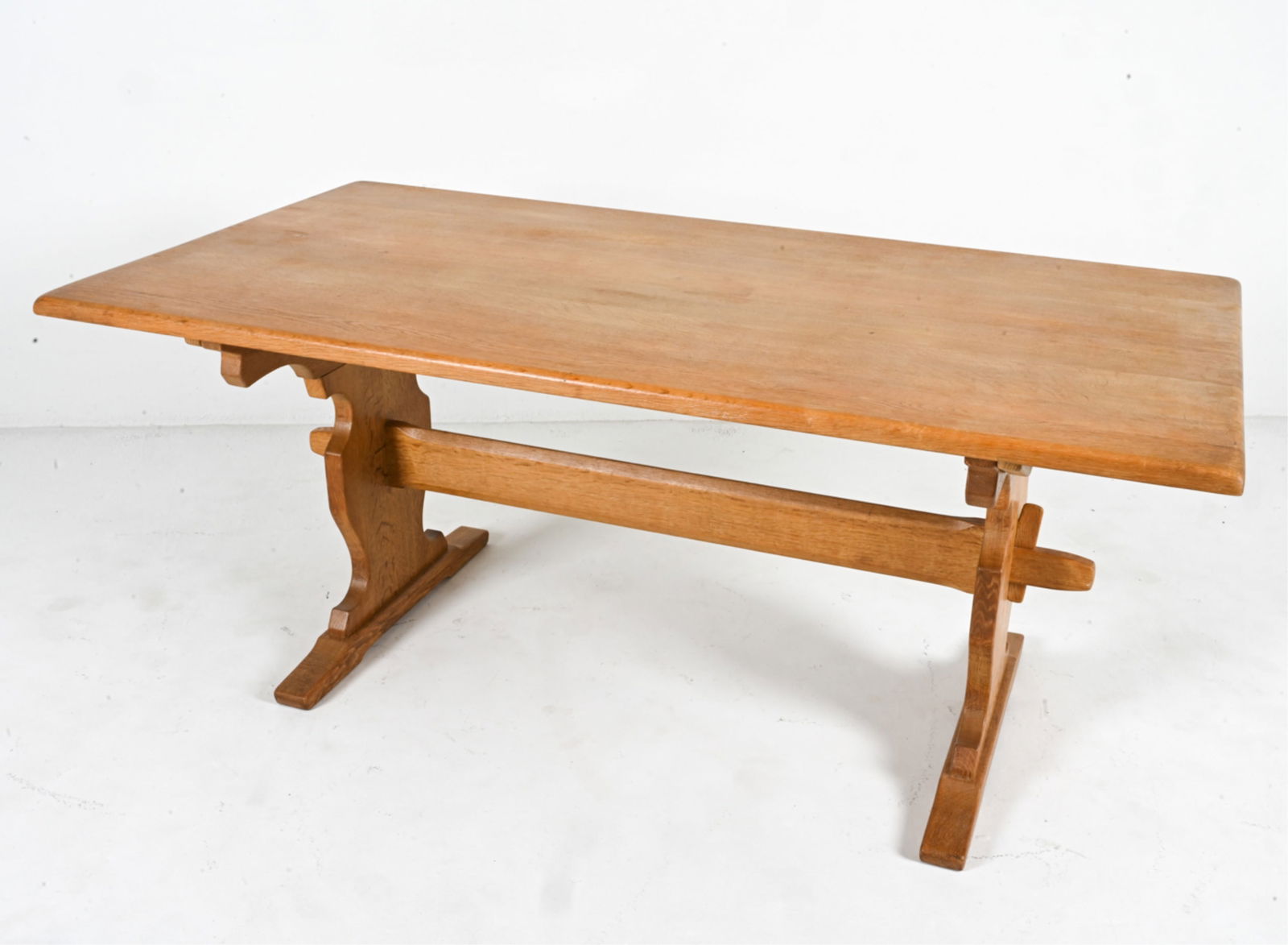 MANNER OF HENNING KJAERNULF OAK TRESTLE TABLE (1 of 19)