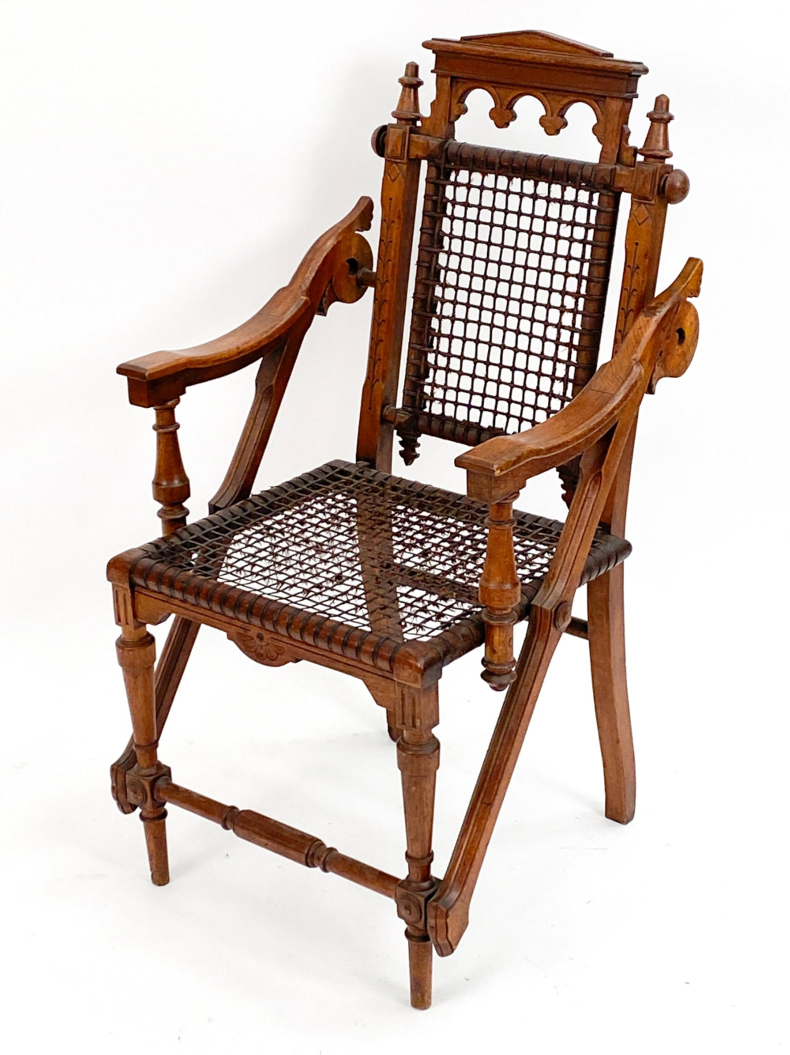 GEORGE HUNZINGER ARMCHAIR, C. 1870?S: Victorian armchair by George Hunzinger (1835-1998). Signed on back leg with NY patent dates of 1869 and 1876. Dimensions: H 39" x W 21.5" x D 23" Condition: Nice patina. Surface wear, scuffs and small