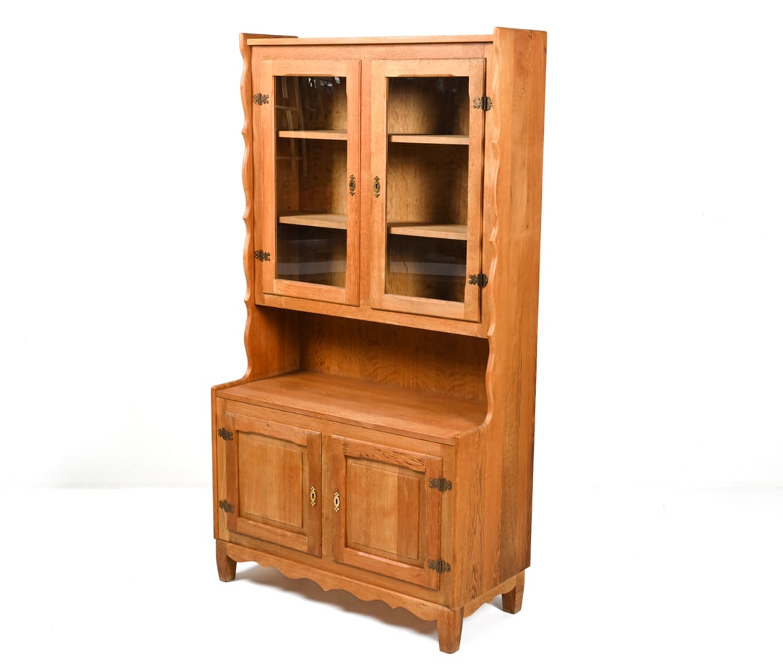 HENNING KJAERNULF-STYLE DANISH OAK CABINET: Labeled J. K. Mobler on back panel. Denmark, c. 1970's. Key included. Dimensions: H 72.5" x W 39.25" x D 17.75" Condition: Very slight tobacco odor to interior. Minimal separation to side panels. A fe