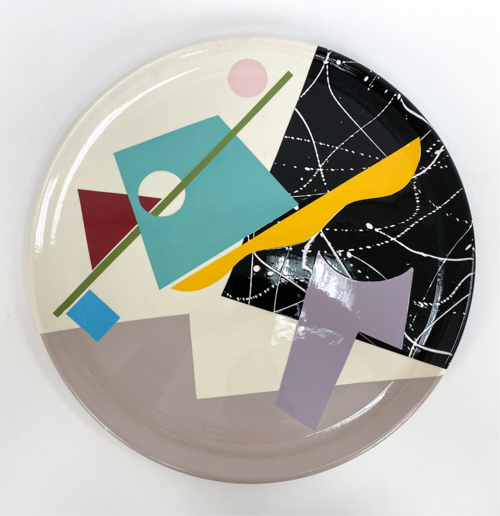 RITA DUVALL (AMERICAN, 1959-2004) CHARGER: Signed and dated 1989 underneath. Wired to hang. Dimensions: Dia 20.5" Condition: Couple small glaze losses to rim.