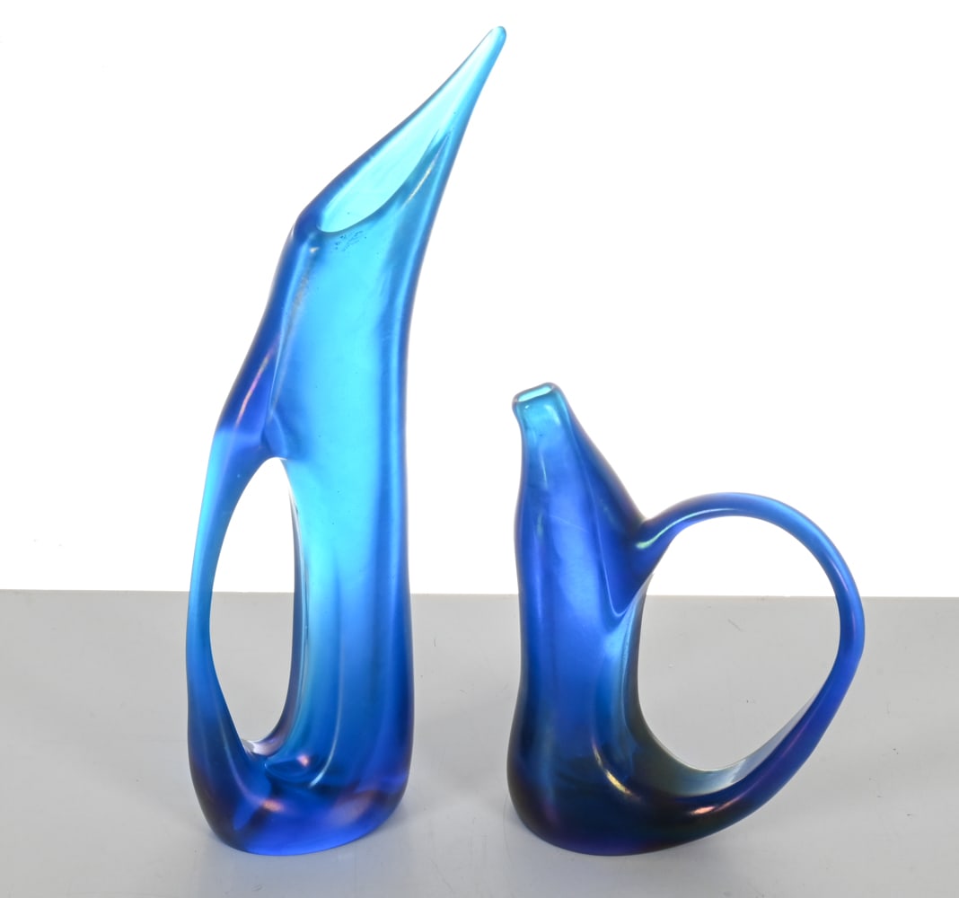 (2) GIORGIO FERRO MURANO 'ANSE VOLANTE' VESSELS: Two Giorgio Ferro glass vessels from the 'Anse Volanti' series for Arte Vetraria Muranese (AVeM), c. 1950's. Vibrant blue iridescent glass. Apparently unsigned. Dimensions: (Tallest) H16" x W 6" x D 2