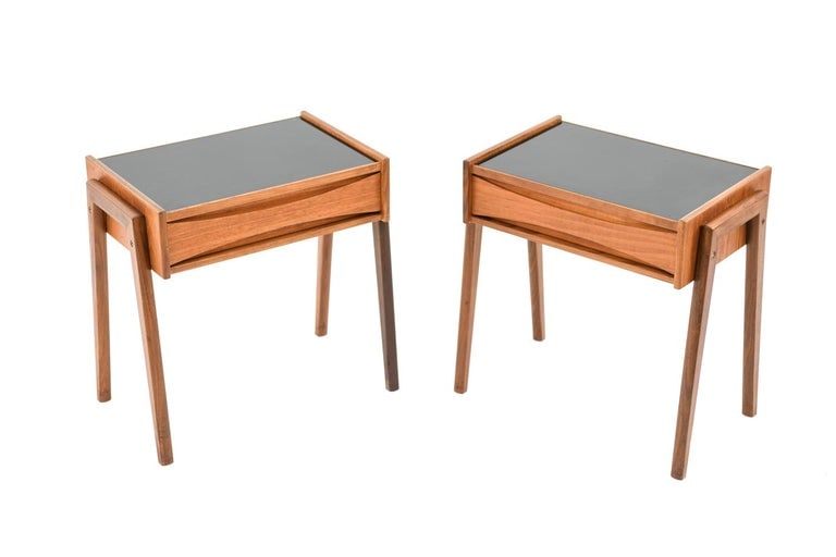 PAIR OF ARNE VODDER TEAK & BLACK GLASS END TABLES: Arne Vodder for Sibast, Denmark, c. 1960's. Dimensions: H 17.5" x W 18" x D 11" Condition: One small chip to underside of glass. Pair presents very well overall. GA012