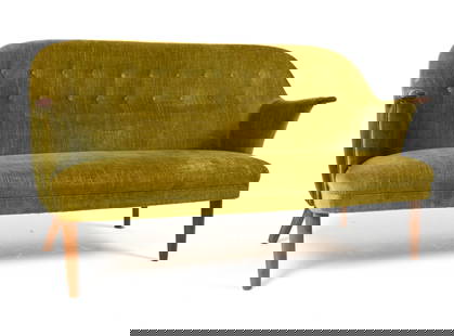 MANNER OF GEORG THAMS TEAK & MOHAIR SOFA: Cocktail sofa with subtly curved seat, featuring teak legs and paw-arms. In the manner of Georg Thams for Vejen Polstermobelfabrik. Denmark, circa 1950's. Dimensions: H 31" x W 58" x D 27". SH 15". Co