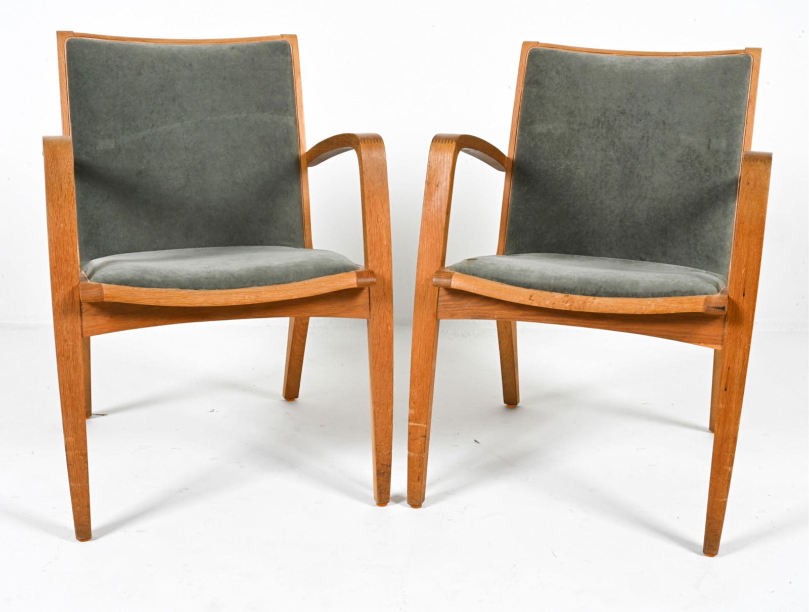 (2) ATTR. JAKOB BERG SC MOBLER OAK 'ARA' CHAIRS: Oak and velvet. Denmark, c. Late 20th Century. Dimensions: H 31.75" x W 22.25" x D 20.25". SH 16.5". Condition: Small spots of discoloration on wood, fabric. Scuffs and scratches to legs. Small areas