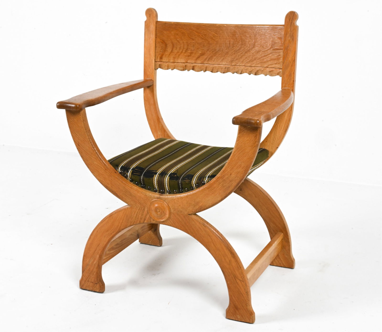 HENNING KJAERNULF FOR EG OAK 'KURUL' ARMCHAIR: Quarter-sawn oak. Designed by Henry (Henning) Kjaernulf for EG Kvalitetsmobel. Denmark, circa 1960's. Dimensions: H 34.75" x W 25.75" x D 20". SH 16.75". Condition: Wear to fabric on edge of seat, loo