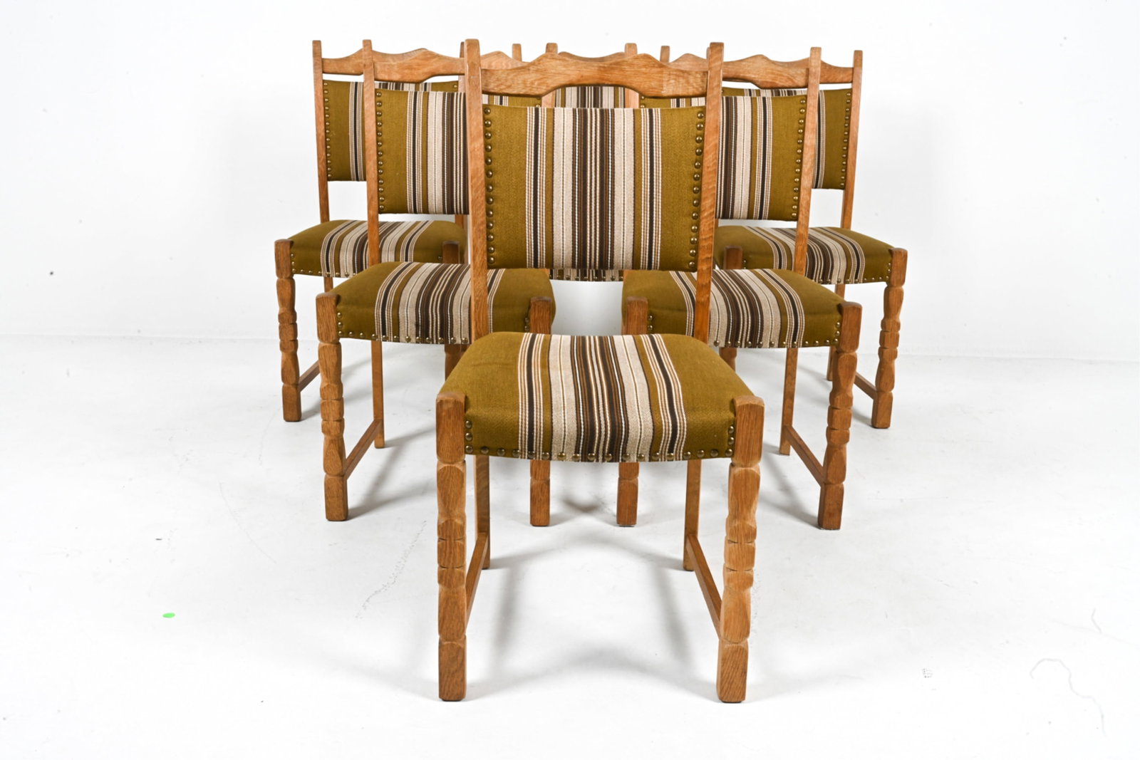 (6) HENNING KJAERNULF OAK DINING CHAIRS: Danish, circa 1960's. Dimensions: H 36.75" x W 17.25" x D 19". SH 17.5". Condition: Minor scuffs, dings. Wear expected from age and use. DME 044