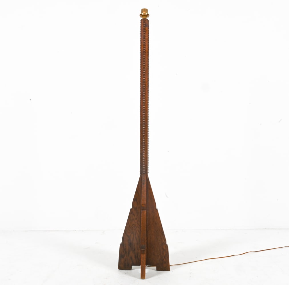 ART DECO AMSTERDAM SCHOOL OAK ROCKET FLOOR LAMP: Unusual Dutch Art Deco floor lamp with beaded moldings and rocket-style silhouette. In the style of Cor Alons. Netherlands, c. 1930's. Dimensions: H 60.75" x W 13". Condition: Wiring untested, Europea