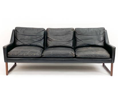 RUDOLF GLATZEL FOR KILL INTERNATIONAL LEATHER SOFA: Germany, c. 1960's. Dimensions: H 30" x W 74" x D 30" x SH 16.5". Condition: Wear to leather consistent with age and use. Couple ding and small marks to wood. PF169