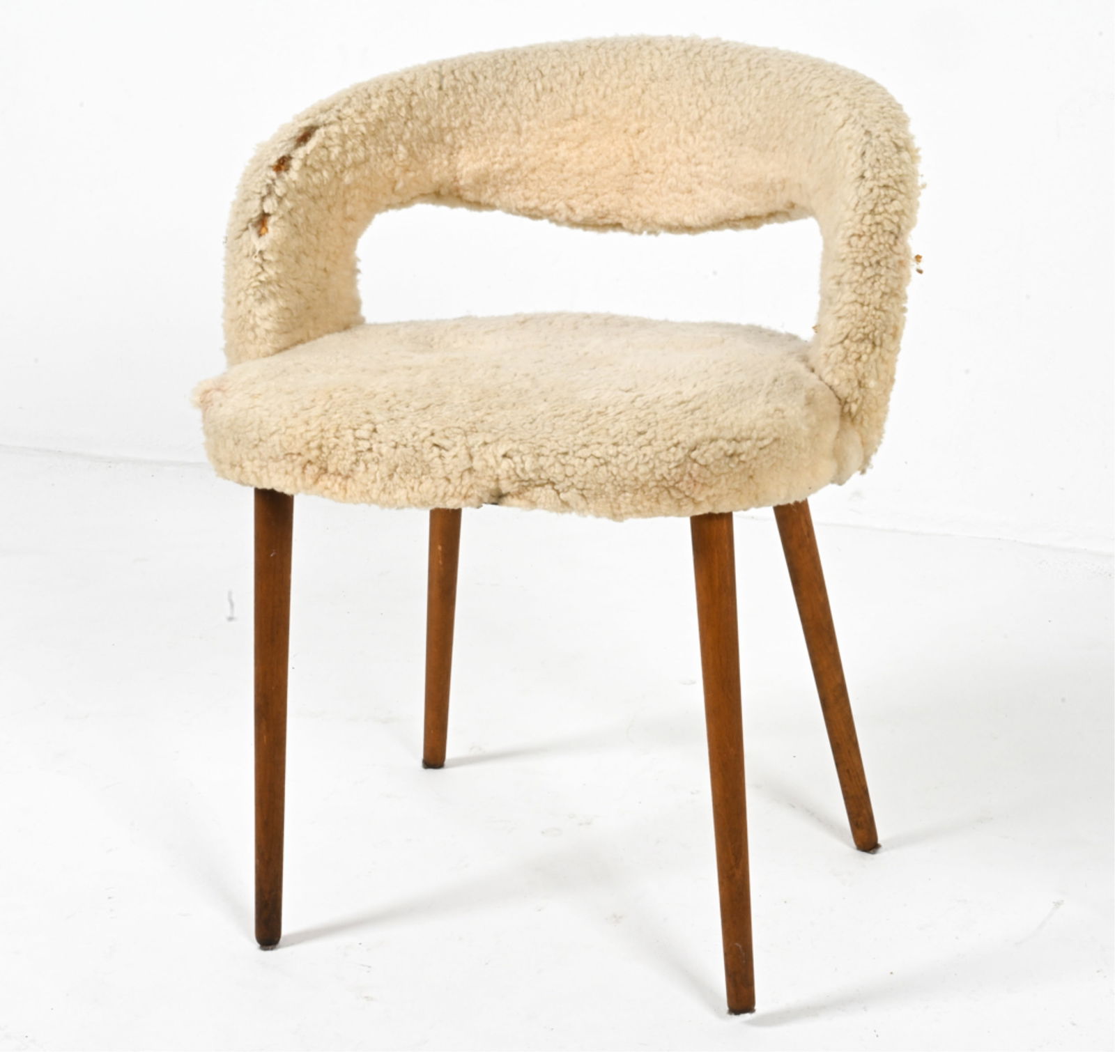 MANNER OF FRODE HOLM SCULPTURAL CHAIR: Beech and wool. Scandinavian, c. 195's. Dimensions: H 28" x W 24" x D 21.75". Condition: Surface soiling from use, small spots worn through upholstery on left arm.