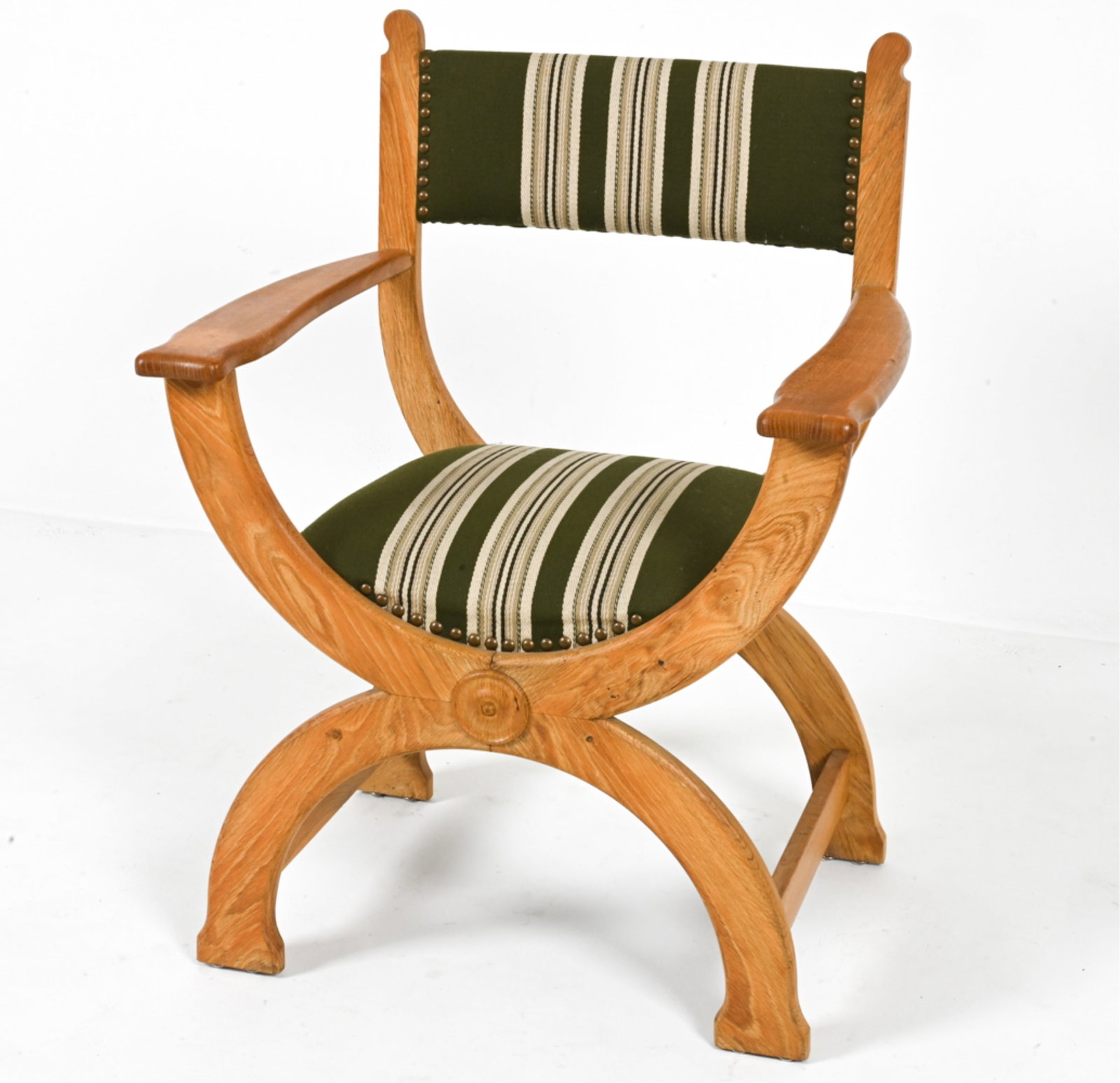 HENNING KJAERNULF FOR EG OAK 'KURUL' ARMCHAIR: Curule-inspired armchair in quarter-sawn oak, designed by Henry (Henning) Kjaernulf for EG Kvalitetsmobel. Denmark, c. 1960's-1970's. Dimensions: H 35" x W 26" x D 20". SH 17". Condition: Wear expecte