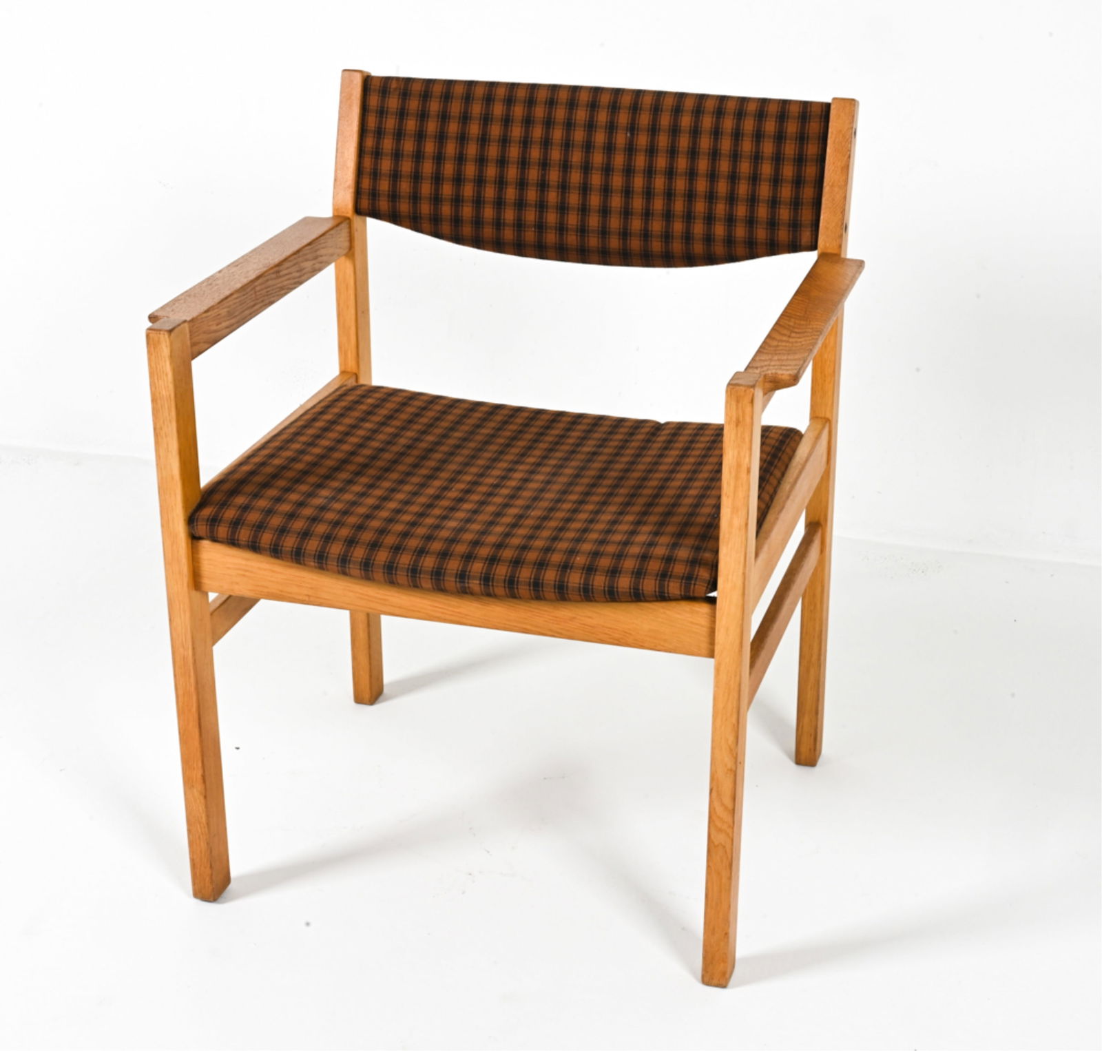 ATTR. ERIK WORTS FOR FDB MOBLER OAK ARMCHAIR: FDB logo stamp to inner edge of front seat rail. Denmark, c. 1960's. Dimensions: H 30.25" x W 25" x D 20". SH 16.5". Condition: Light scuffs, scratches to edges of wood. Expected from age and use. C04