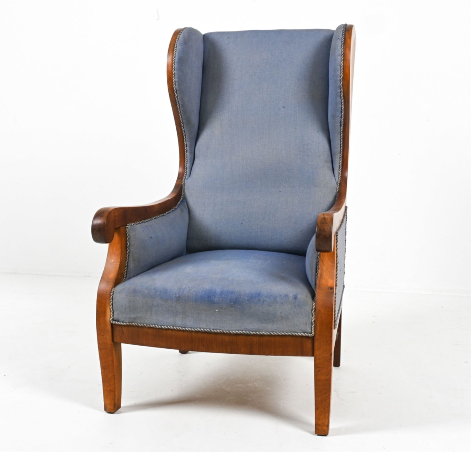 MAHOGANY WINGBACK ARMCHAIR BY FRITS HENNINGSEN: Denmark, c. 1950's-1960's. Dimensions: H 42.5" x W 22.25" x D 29". SH 15". Condition: Wear and discoloration to fabric upholstery from age and use. C125
