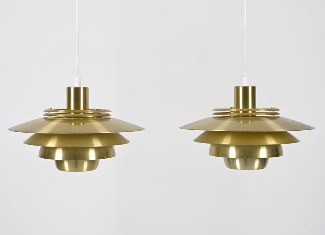 PAIR OF SCANDINAVIAN MODERN SAUCER PENDANTS: Brushed goldtone finish. c. 1970's. Dimensions: H 8" x Dia. 12.5" Conditions: Wiring not tested. A few minor spots of patination, presents very well overall