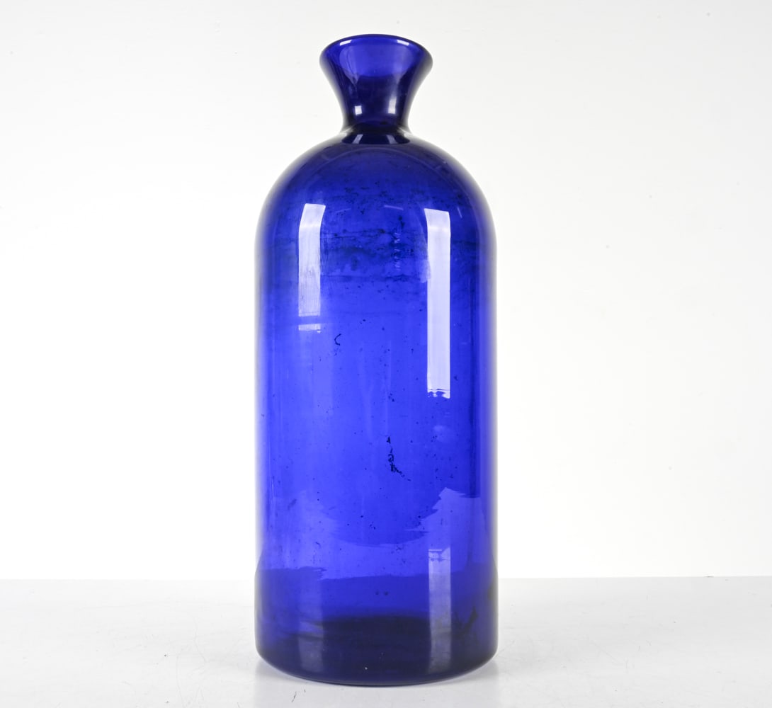 ATTR. OTTO BRAUER HOLMEGAARD COBALT GLASS VASE: Denmark, c. 1959. Dimensions: H 19.25" x Dia. 7.5". Condition: Light surface scuffs near base, underneath.