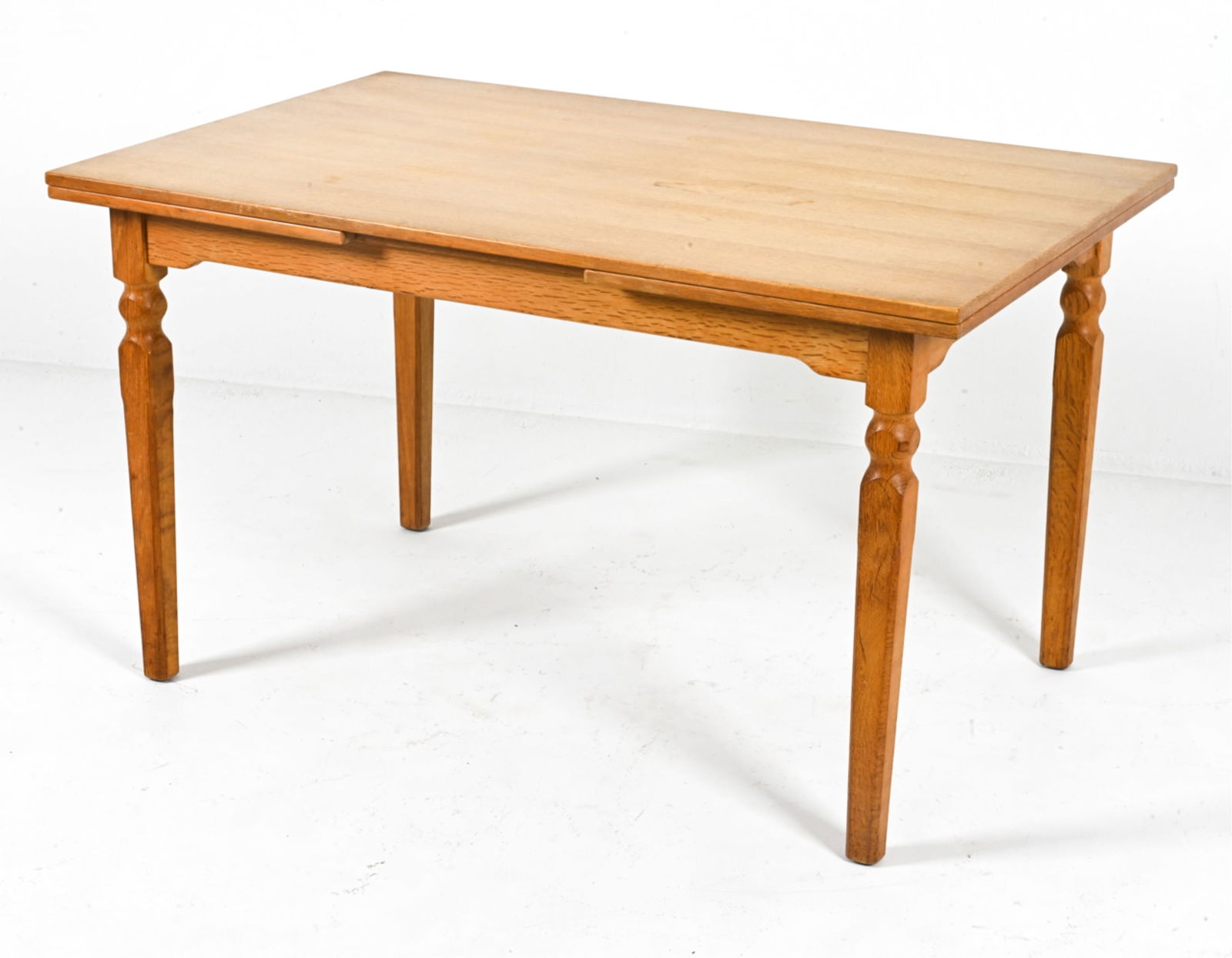 MANNER OF HENNING KJAERNULF OAK DINING TABLE (1 of 10)