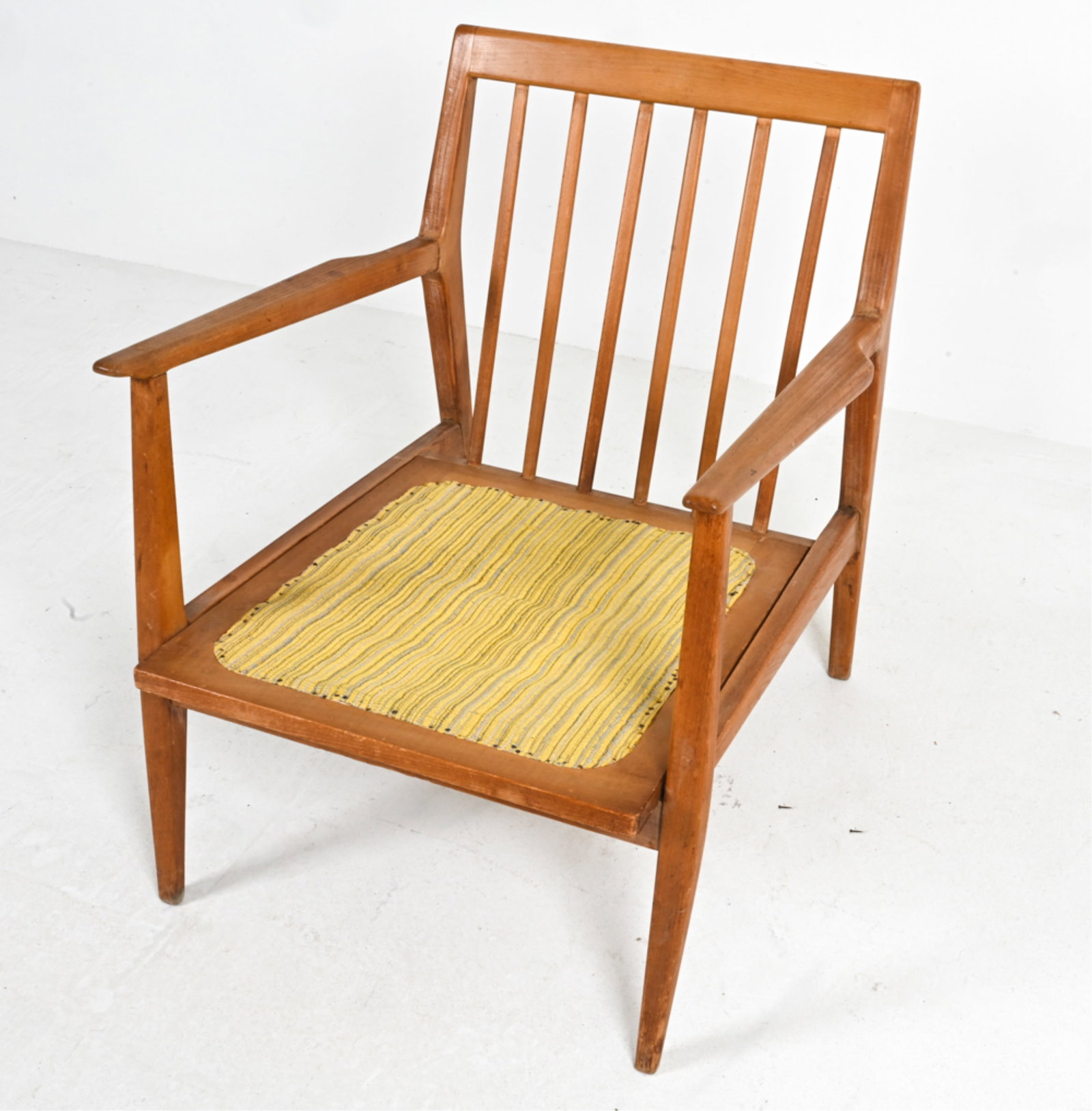 DANISH MID-CENTURY MODERN TEAK LOUNGE CHAIR: Circa 1960's. Dimensions: H 27.5" x W 24.25" x D 25.25" x SH 12.5". Condition: Repair made to right arm. Minor surface soiling.