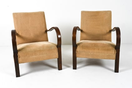 (2) MANNER OF FRITZ HANSEN EARLY MODERN ARMCHAIRS