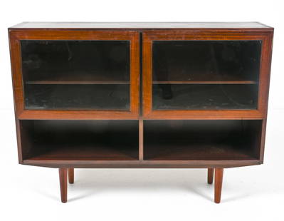 GUNNI OMANN FOR OMANN JUN ROSEWOOD BOOKCASE: Bookcase or display cabinet with glass doors. From the "Classic" storage system, designed by Gunni Omann for Omann Jun. Labeled on back panel. Smaller interior shelves (behind glass) are adjustable. D