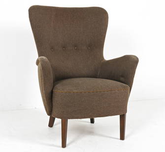 MANNER OF THEO RUTH WINGBACK ARM CHAIR: Upholstered in wool fabric. Beech legs. Circa 1960's. Dimensions: H 37" x W 29.25" x D 25.5" x SH 15.5". Condition: Some wear to fabric on arms, loose threads. DMF081