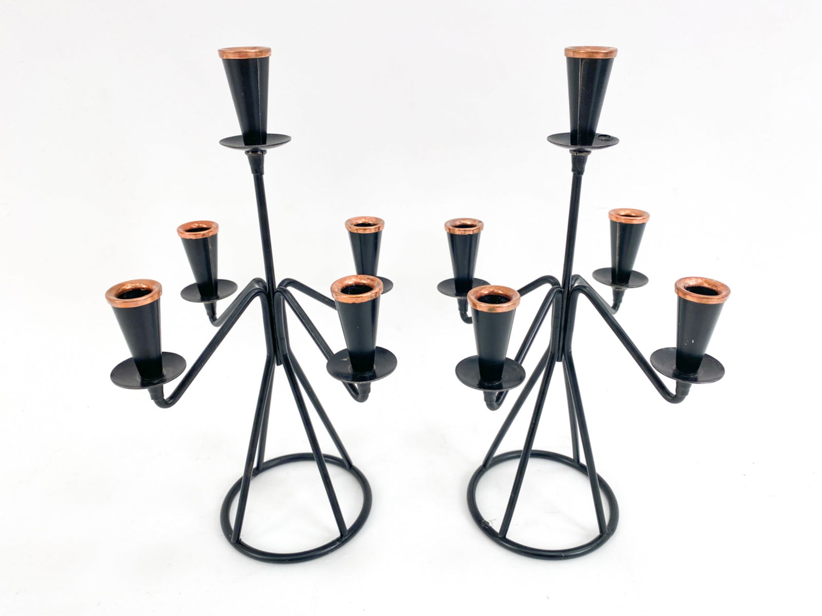 PAIR OF GUNNAR ANDER STYLE CANDELABRAS: (2) Vintage five-arm candelabras in the manner of Gunner Ander. Ebonized metal. Dimensions: H 9.5" x W 6" x D 6" Condition: Minor surface wear consistent with age and use.