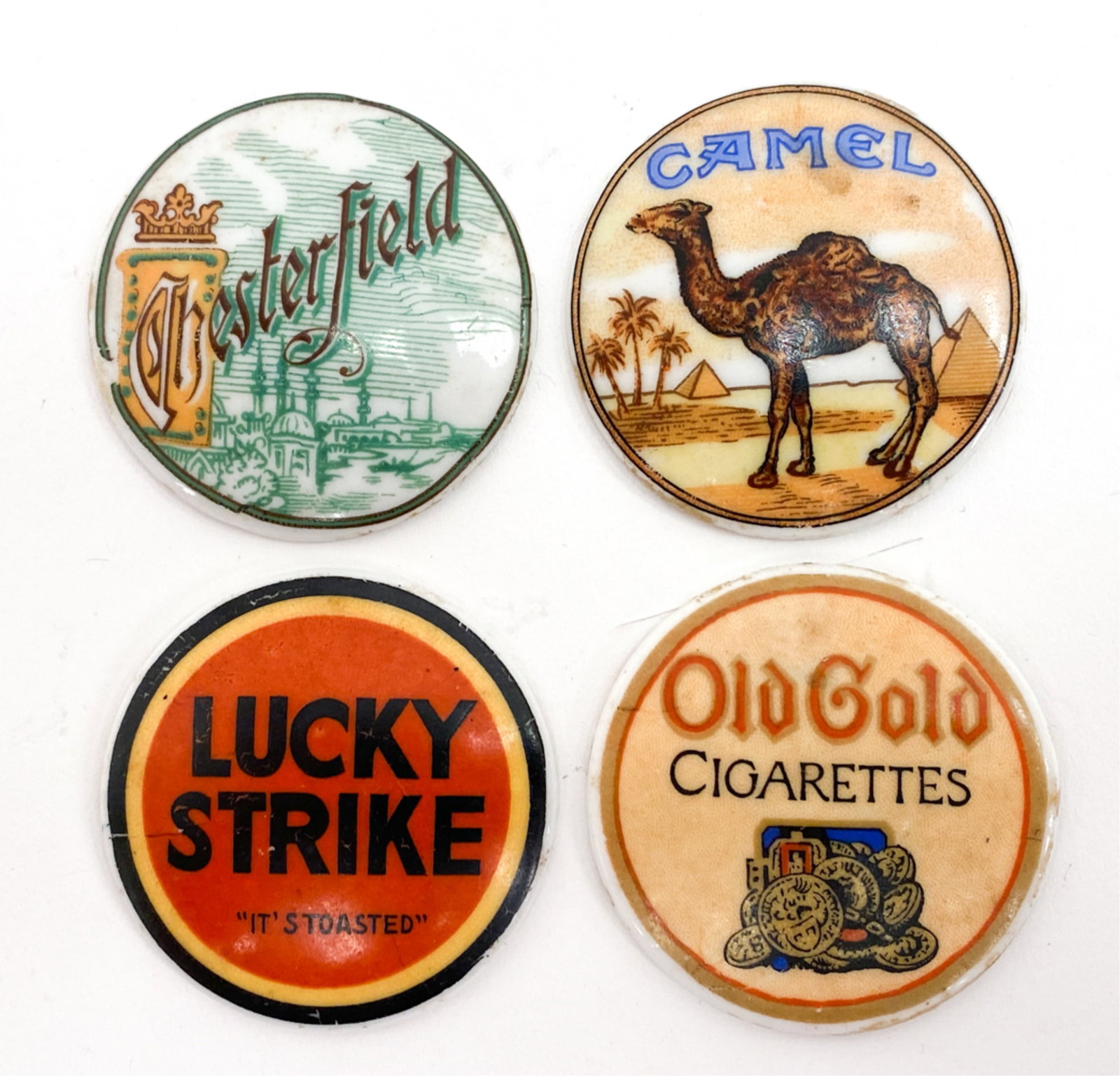 (4) ANTIQUE CIGARETTE ADVERTISING PORCELAIN: 4 round slightly convex porcelains with cigarette advertisements. All with glue remains verso from attachment. Dimensions: Dia 1.75" Condition: Some age wear.