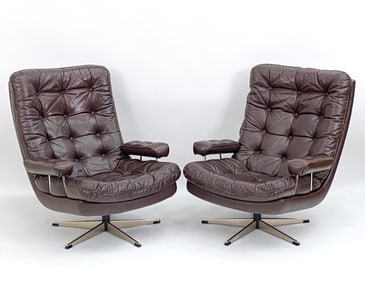 PAIR OF DANISH LEATHER SWIVEL ARMCHAIRS