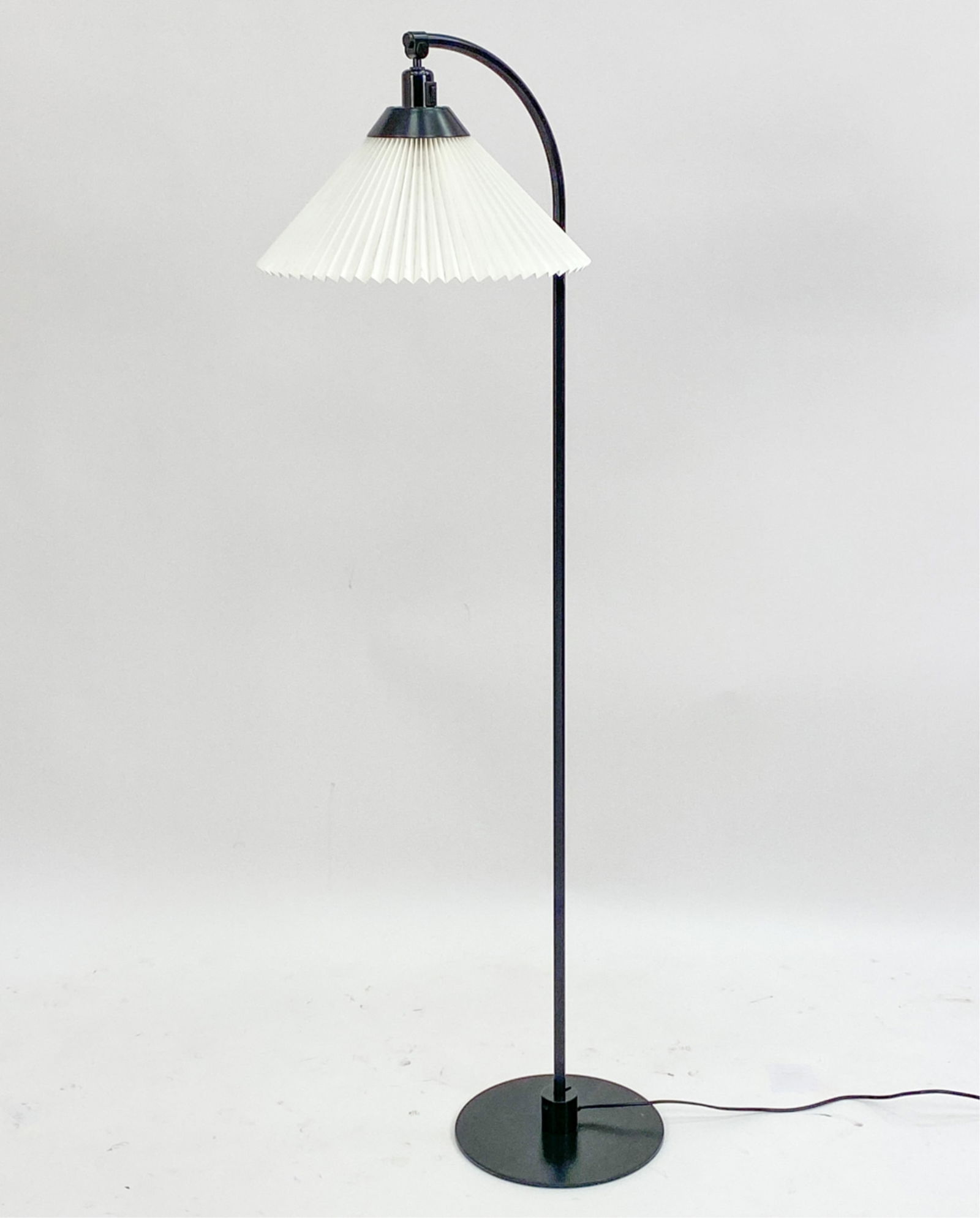 FLEMMING AGGER 'LE KLINT' 368 FLOOR LAMP: Le Klint Model 368 is a classic timeless reading lamp designed by Flemming Agger in 1979. Features a hand folded shade that can be tilted at the top joint. Steel. Dimensions: H 58" x W 11" x D 16" Con