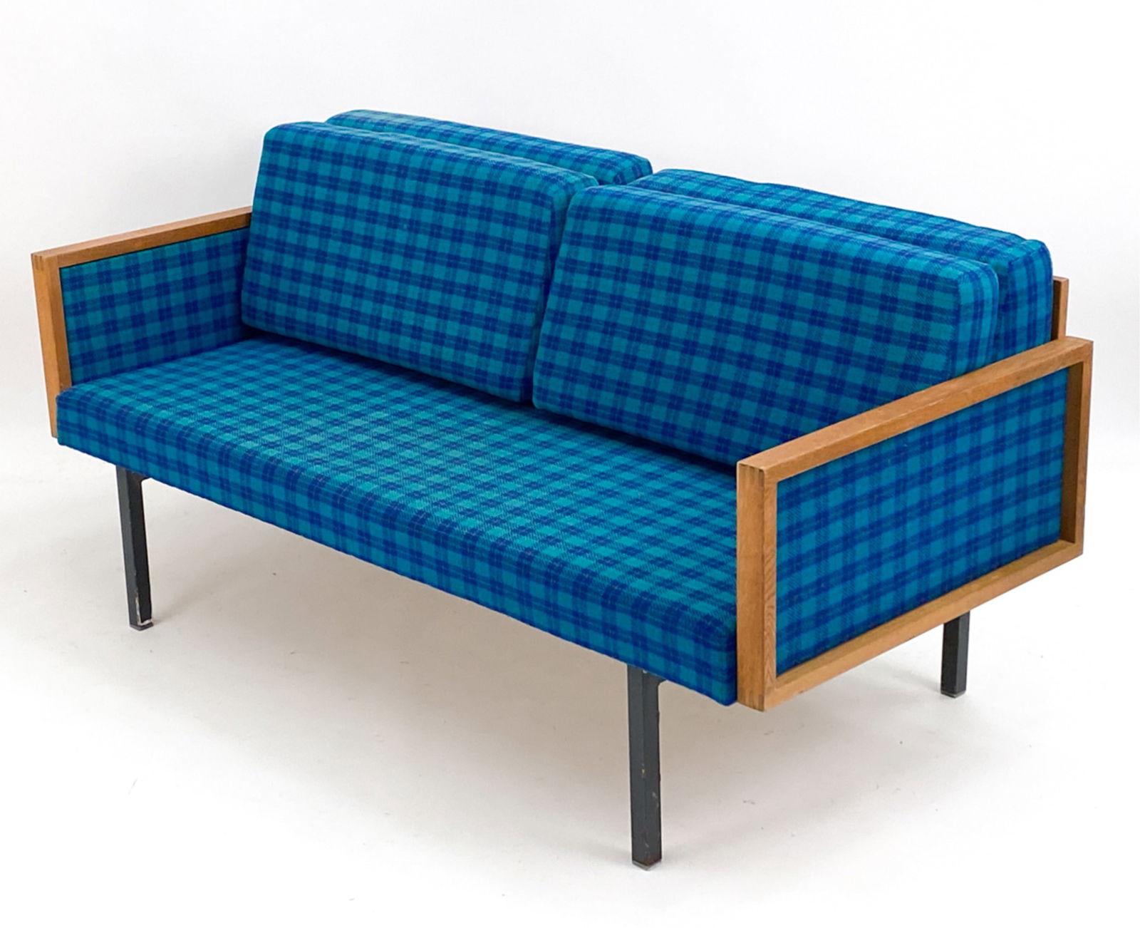 MID-CENTURY NIELS EILERSEN SOFA C.1970: Oak and upholstery with metal legs. Double back cushions. Unsigned. Dimensions: H 30.5" x W 53" x D 29" x SH 16" Condition: Upholstery seems original. Wear consistent with age and use including rubs t