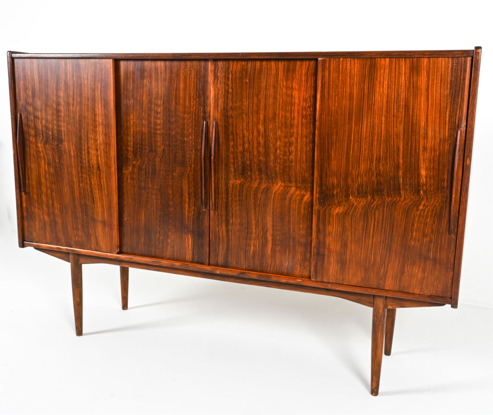 MANNER OF OMANN JUN DANISH ROSEWOOD HIGHBOARD: Adjustable shelves. With dry bar cabinet, backed with mirror with frosted glass design. Circa 1960's. Dimensions: H 46.25" x W 69" x D 17". Condition: Consistent with age and use, Overall in good cond