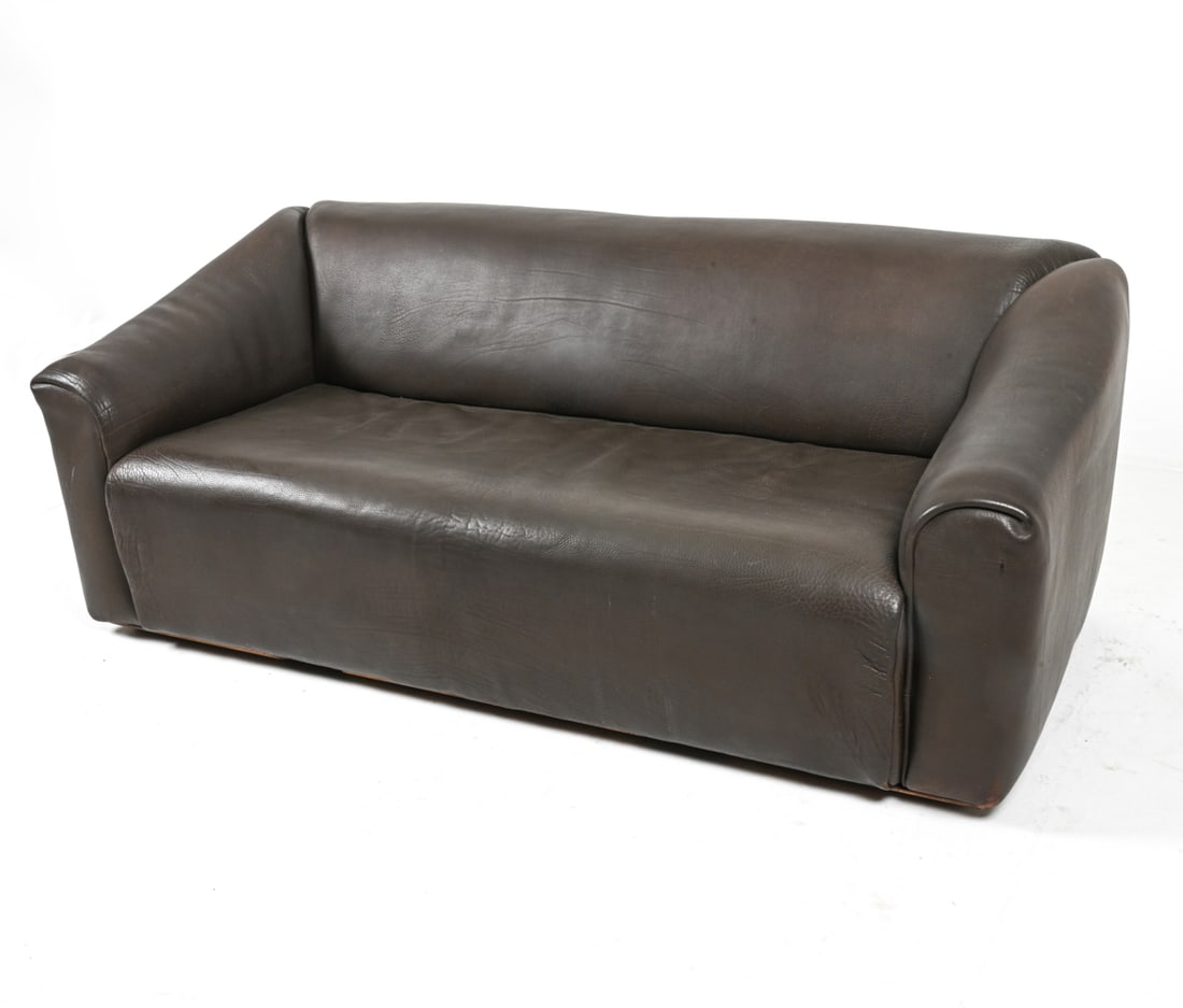 DE SEDE DS-47 BUFFALO LEATHER SOFA C. 1970S: Circa 1970's. Switzerland. Dimensions: H 26.75" x W 70.5" x D 35" x SH 14". Condition: Minor scrapes and signs of wear to leather. PG057