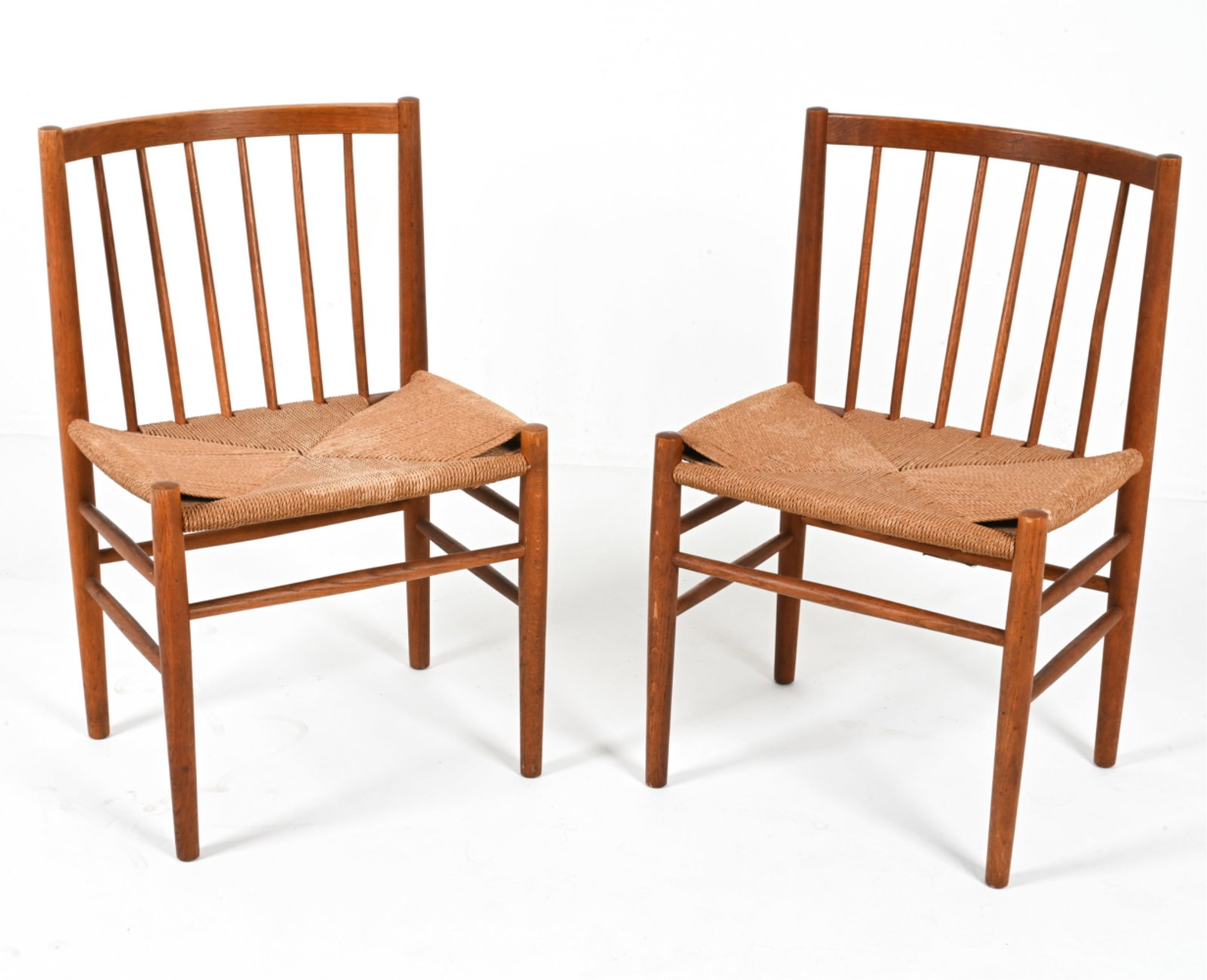 DANISH TEAK & PAPERCORD CHAIRS BY JORGEN BAEKMARK: Model 'J80'. Circa 1950's. Dimensions: H 32" x W 19.75" x D 17" x SH 17.5". Condition: Minor scuffs and scrapes. Wear consistent with age and use. PG175