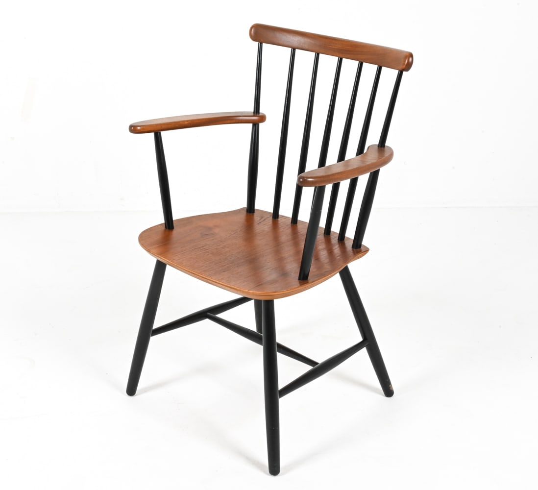 TEAK WINDSOR STYLE CHAIR FOR PASTOE C.1950'S: Spindle-back Windsor style arm chair, designed by Ilmari Tapiovaara. Finnish. Dimensions: H 33.25" x W 21.5" x D 16.75" x SH 16.5". Condition: Some fading to edge of seat, arms, small nick to finish o