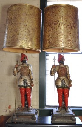 PAIR OF SOLDIER LAMPS: 55" tall to top of shades, some chips to plaster