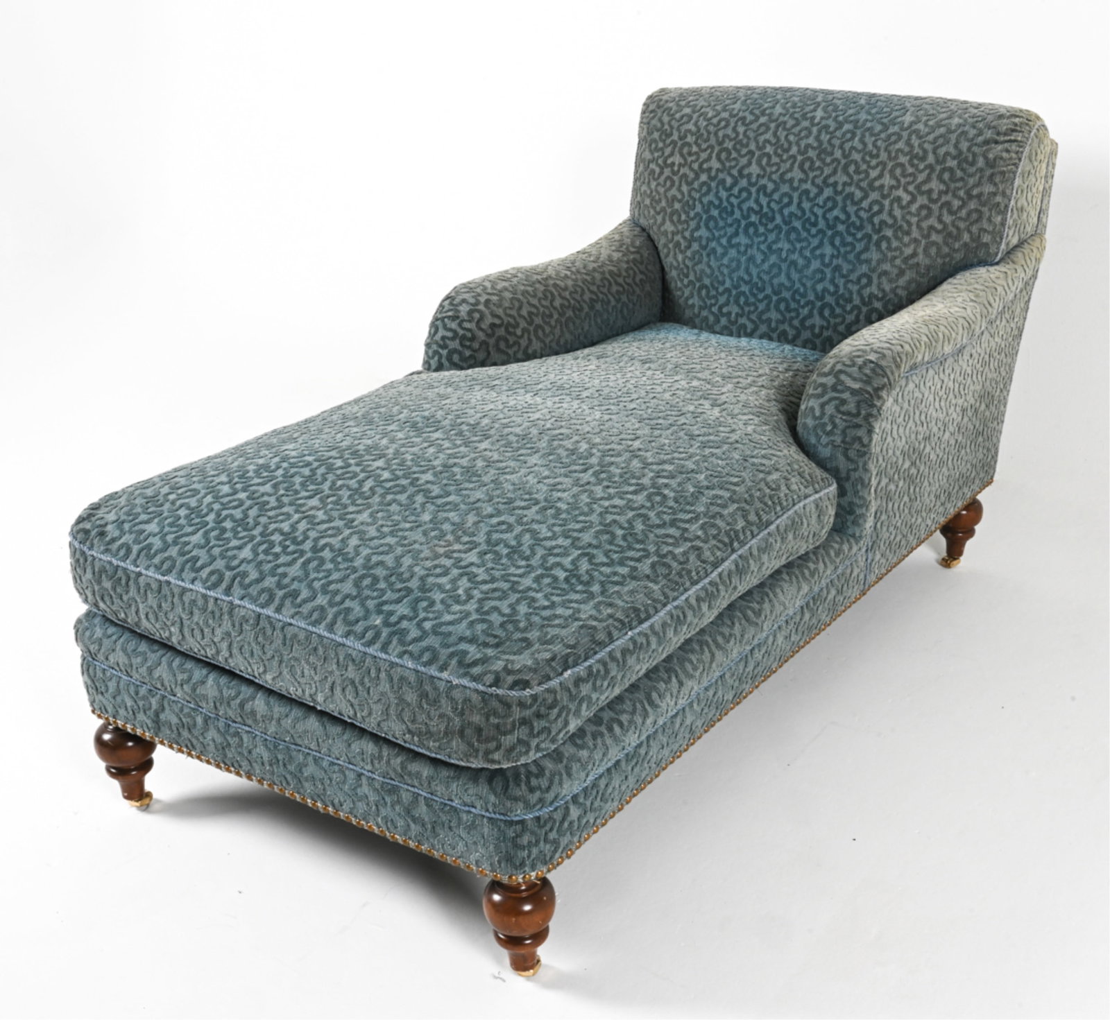CHAISE LOUNGE BY A. SCHNELLER SONS INC: Soft textured upholstery. Beech bun feet. Late 20th century. Dimensions: H 34" x W 64" x D 31.5". Condition: Minor wear and sun fading fading to fabric.