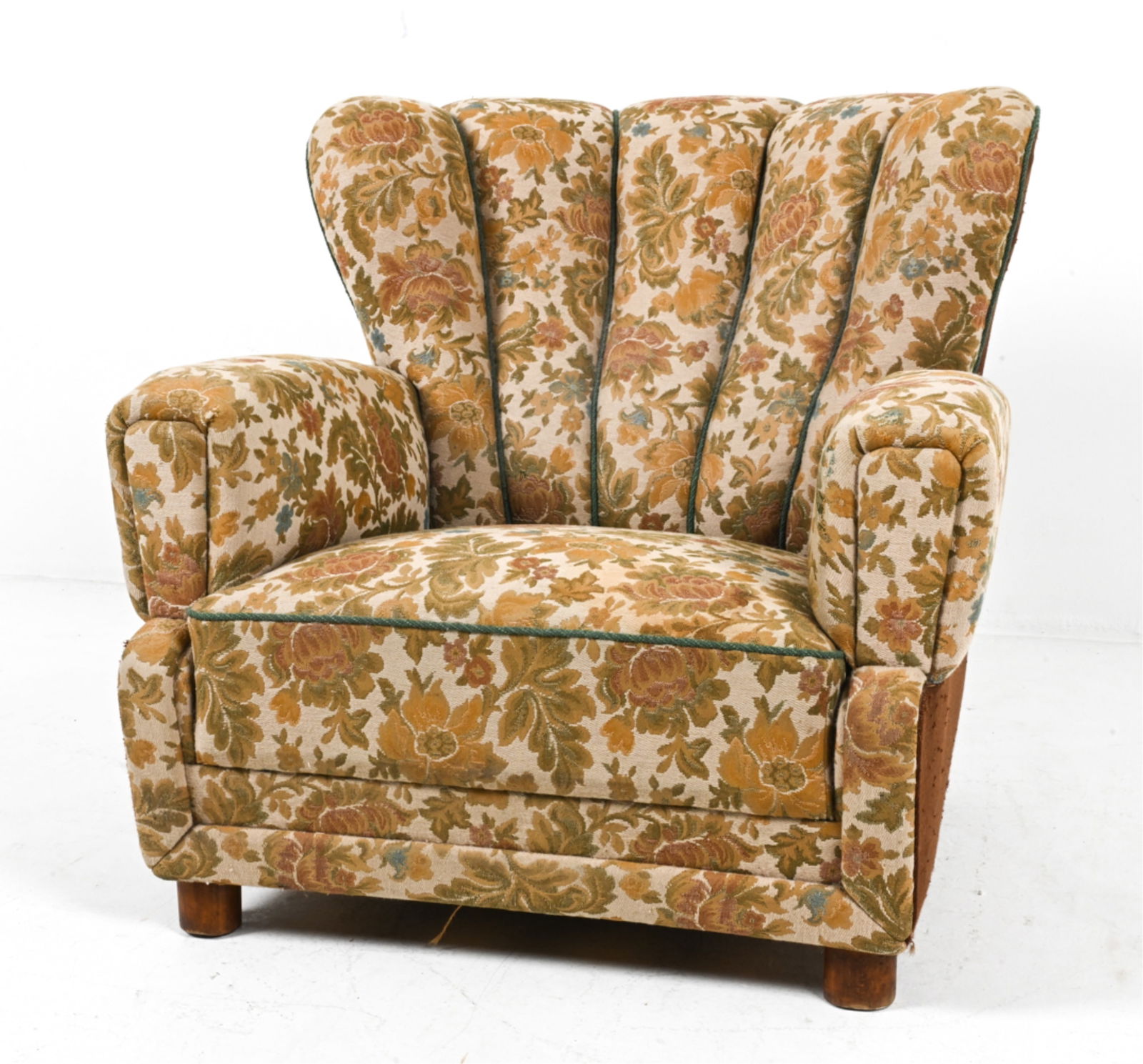 CLUB CHAIR IN THE MANNER OF FRITZ HANSEN, C. 1960: Beech legs. Scandinavian, c. 1950's-1960's. Dimensions: H 33" x W 34.5" x D 34". SH 12". Condition: Some wear to fabric on seat, backing. C016