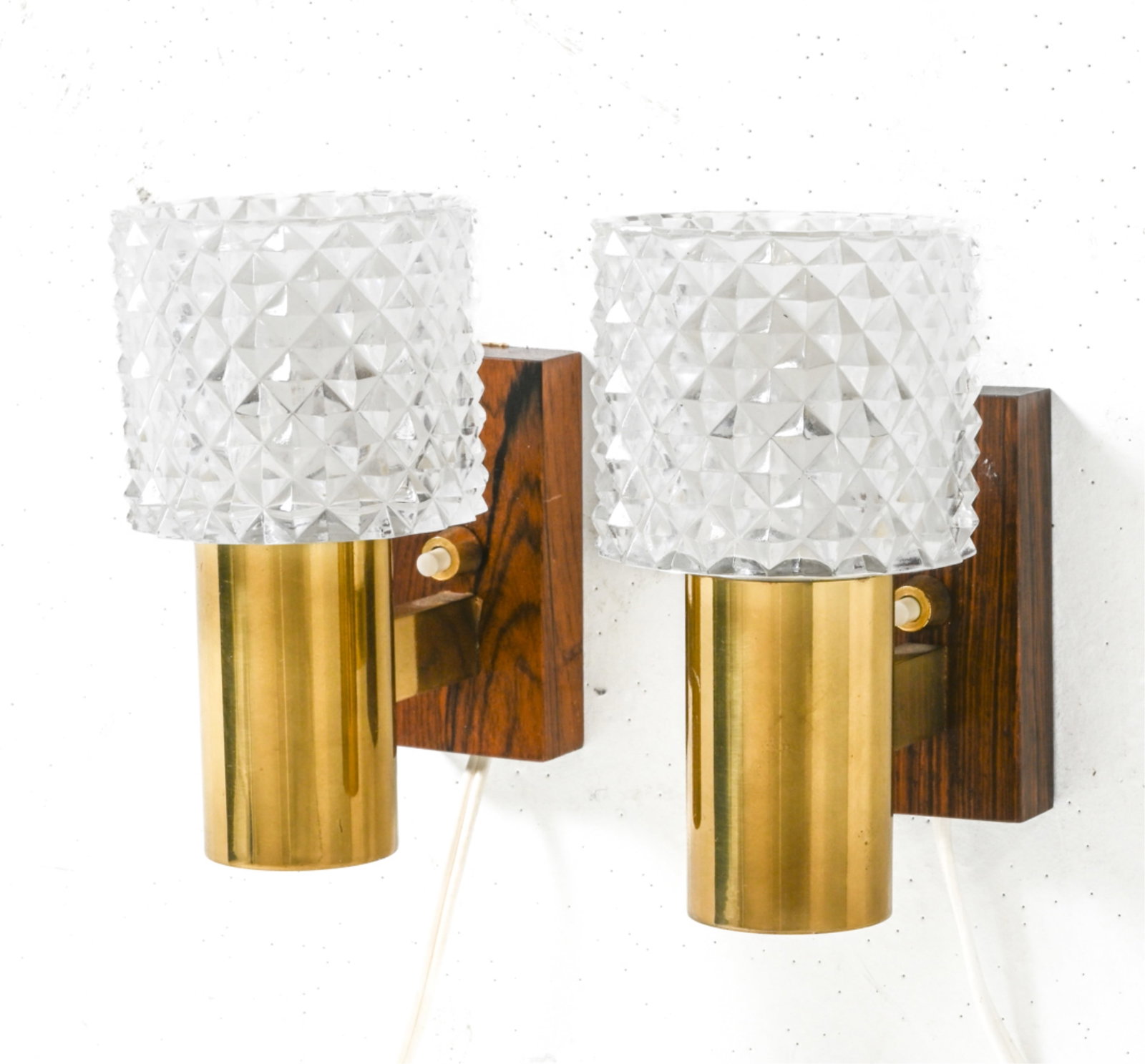 (2) ROSEWOOD, PRESSED GLASS & BRASS SCONCES: Europe, Circa 1960's. Dimensions: H 6" x W 3.5" x D 5.5". Condition: Wires cut, require rewiring. Light scuffs to brass. A192