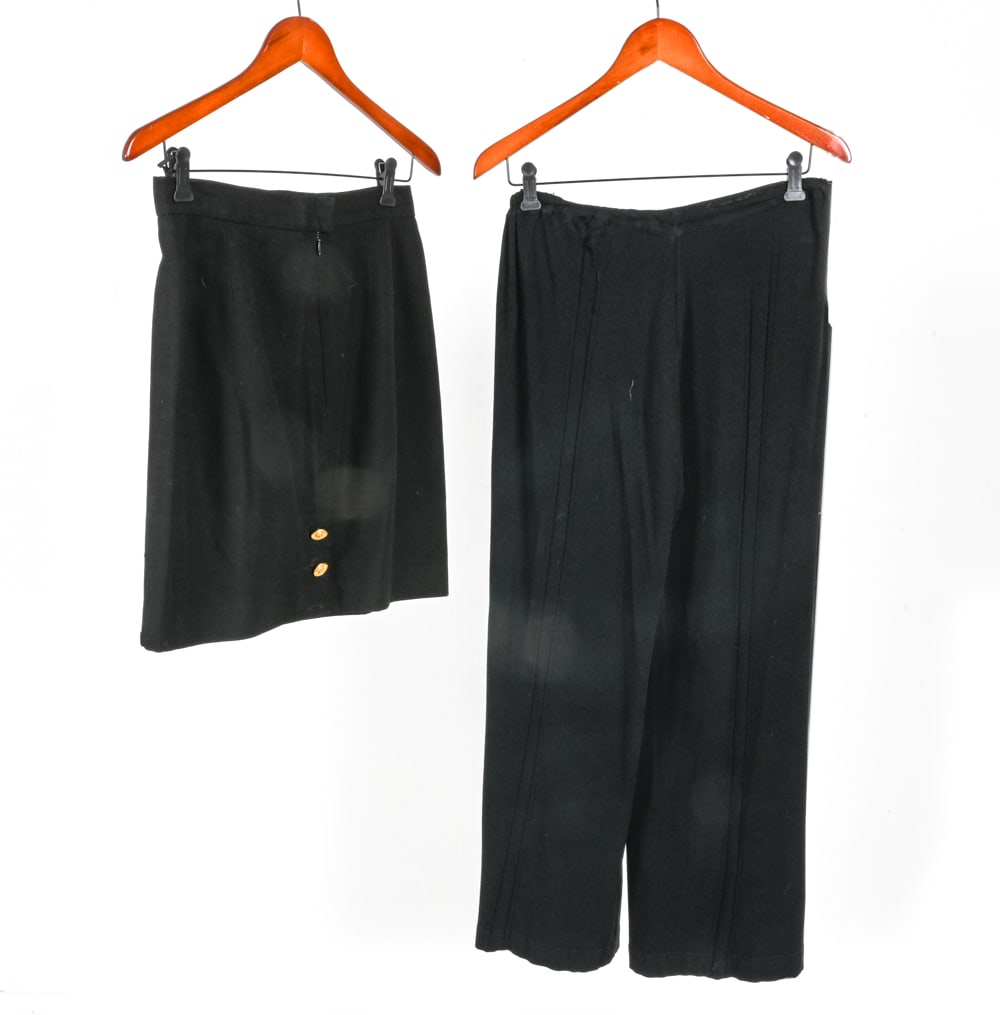 VINTAGE CHANEL SKIRT & TROUSERS: Early 1990's pencil skirt with gold sun buttons, approx waist size 28"; and 1990's knit pants, approx. waist size 27" (with stretch). Condition: As-is; skirt missing labels, possibly missing one butto