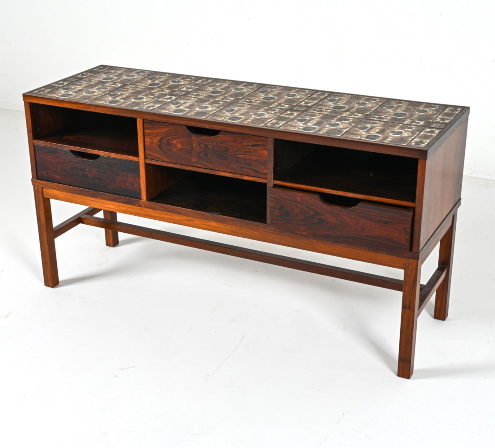 ROSEWOOD LOW CABINET BY SEVERIN HANSEN, C.1960'S: For Haslev Mobelsnedkeri. With tiled porcelain ceramic mosaic top. Dimensions: H 23" x W 43.75" x D 14.5". Condition: Minor scuffs and dings to wood, wear consistent with age and use.