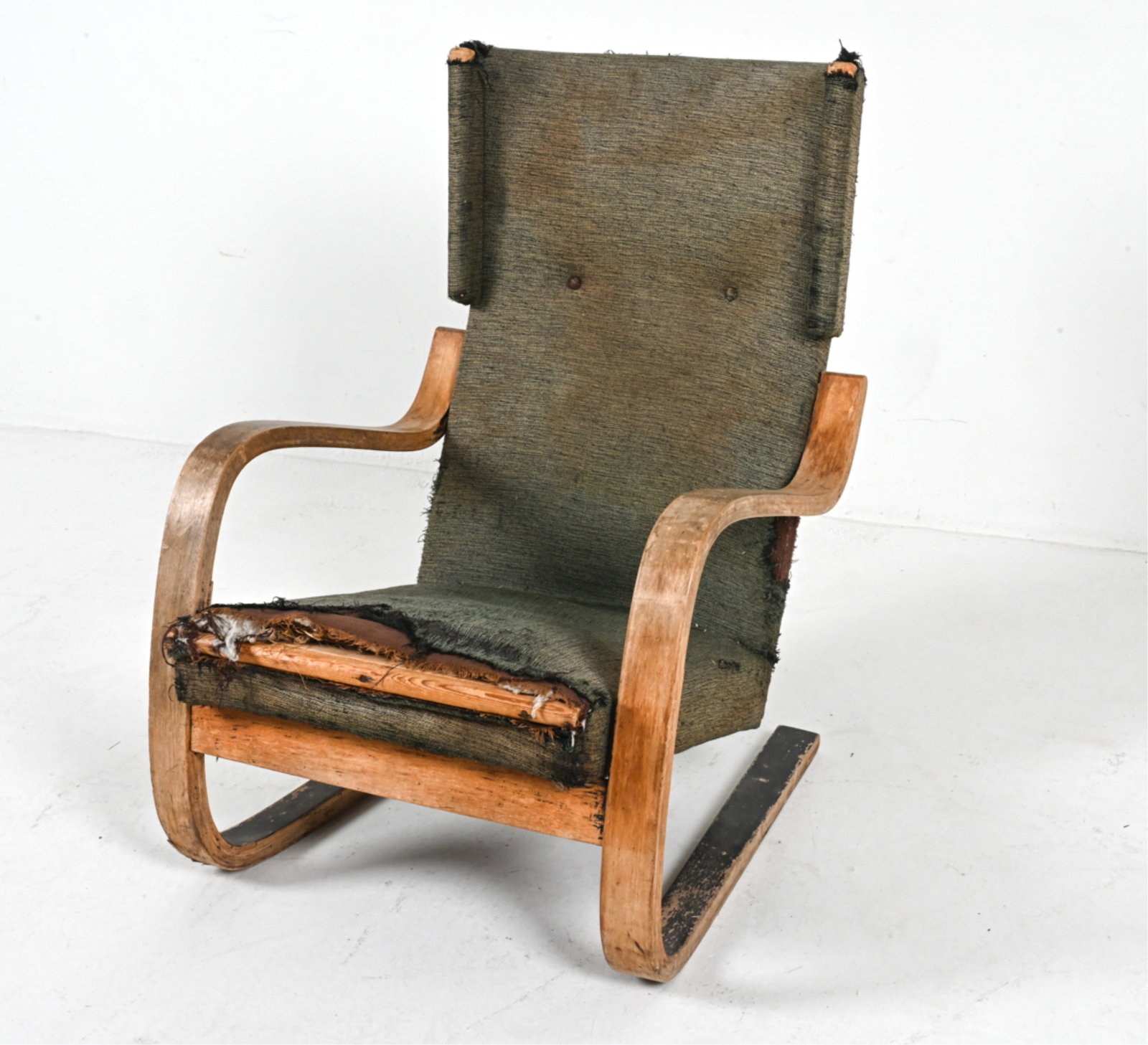 CANTILEVER LOUNGE CHAIR BY ALVAR AALTO: Model 36/401. Laminated bentwood birch construction with fabric upholstery. Finland, circa 1930's. Dimensions: H 35.5" x W 25.5" x D 27". SH 15.25". Condition: Great candidate for restoration. Fabric