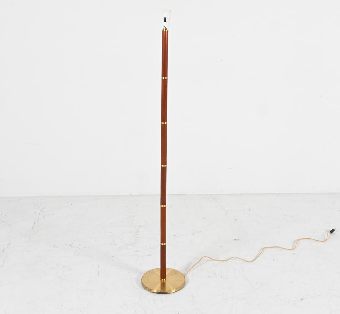 DANISH TEAK AND BRASS FLOOR LAMP, C.1960'S: Dimensions: H 53" x Dia. 9". Condition: Wiring untested. Some scuffs and spots of corrosion on base. Broken piece on plastic socket.