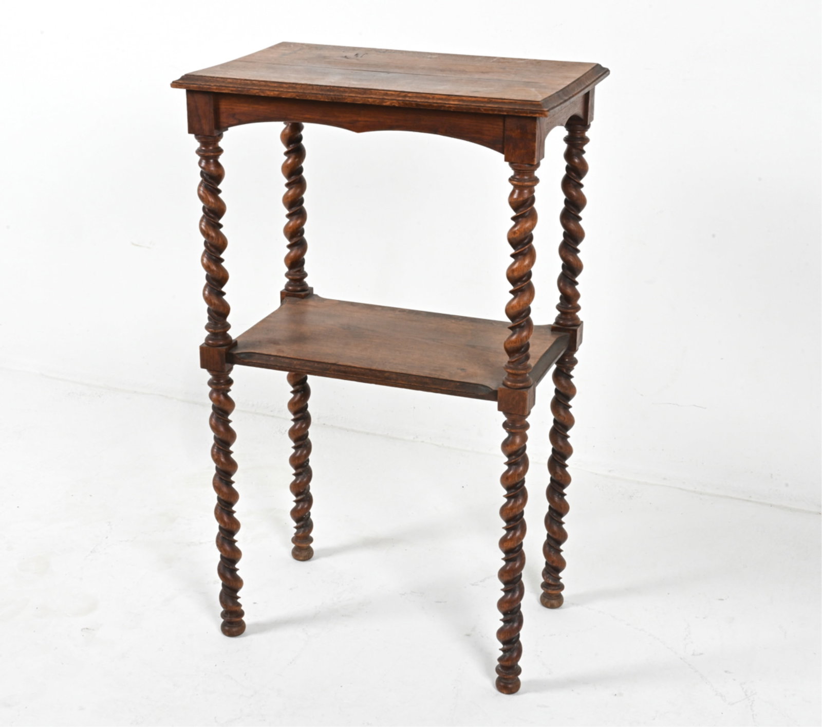 CARVED OAK SIDE ABLE: Dimensions: H 40" x W 24" x D 15.5" Conditions: Wear consistent with age and use, minor stress crack to top. A little wobbly.