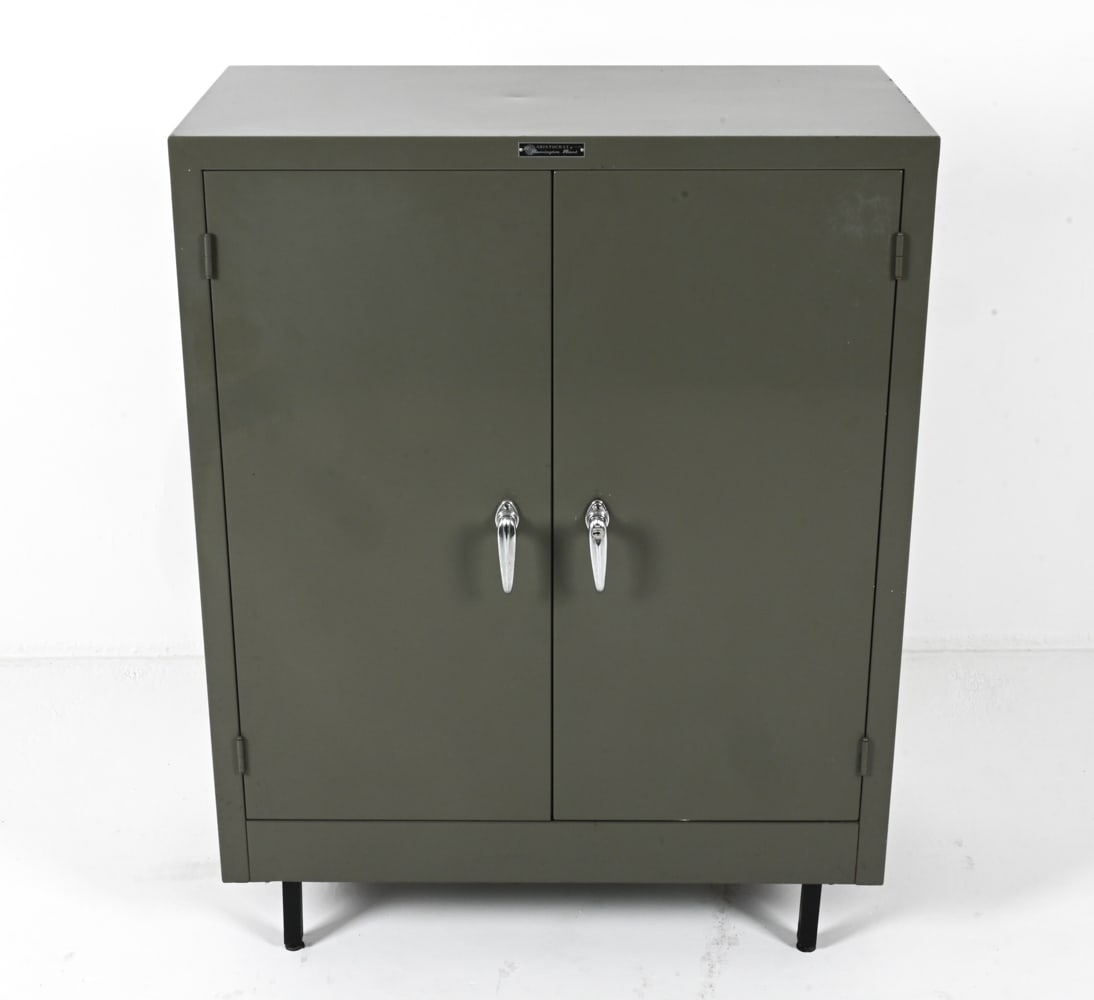 REMINGTON RAND METAL INDUSTRIAL CABINET: Shelves adjustable. Mid 20th century. Dimensions: H 46.5" x W 36" x D 19". Condition: Missing one glider on back leg. Minor losses to painted finish. KON B029