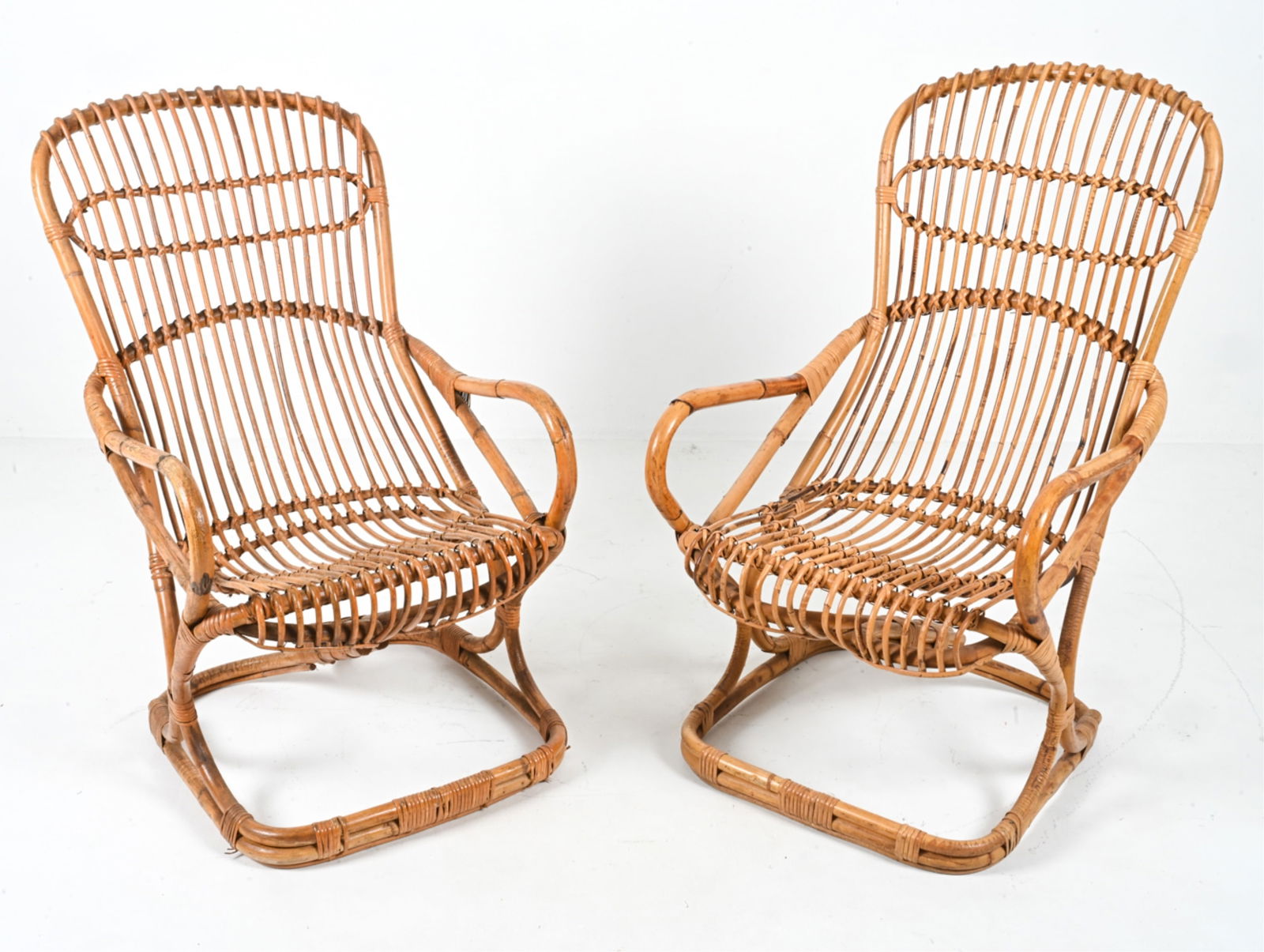 (2) MANNER OF TITO AGNOLI RATTAN ARMCHAIRS (1 of 14)