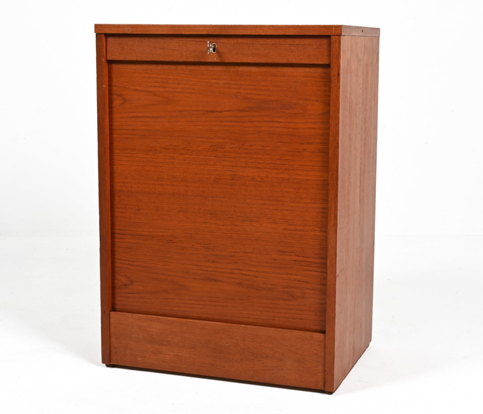 DANISH TEAK TAMBOUR-FRONT CHEST, C. 1970'S: Key included. Dimensions: W 20.1/4" x H 28.5" x D 14.5" Condition: Minor scratches and scuffs on the top of the chest. Label remnants to drawers. Wear consistent with age and use. H039